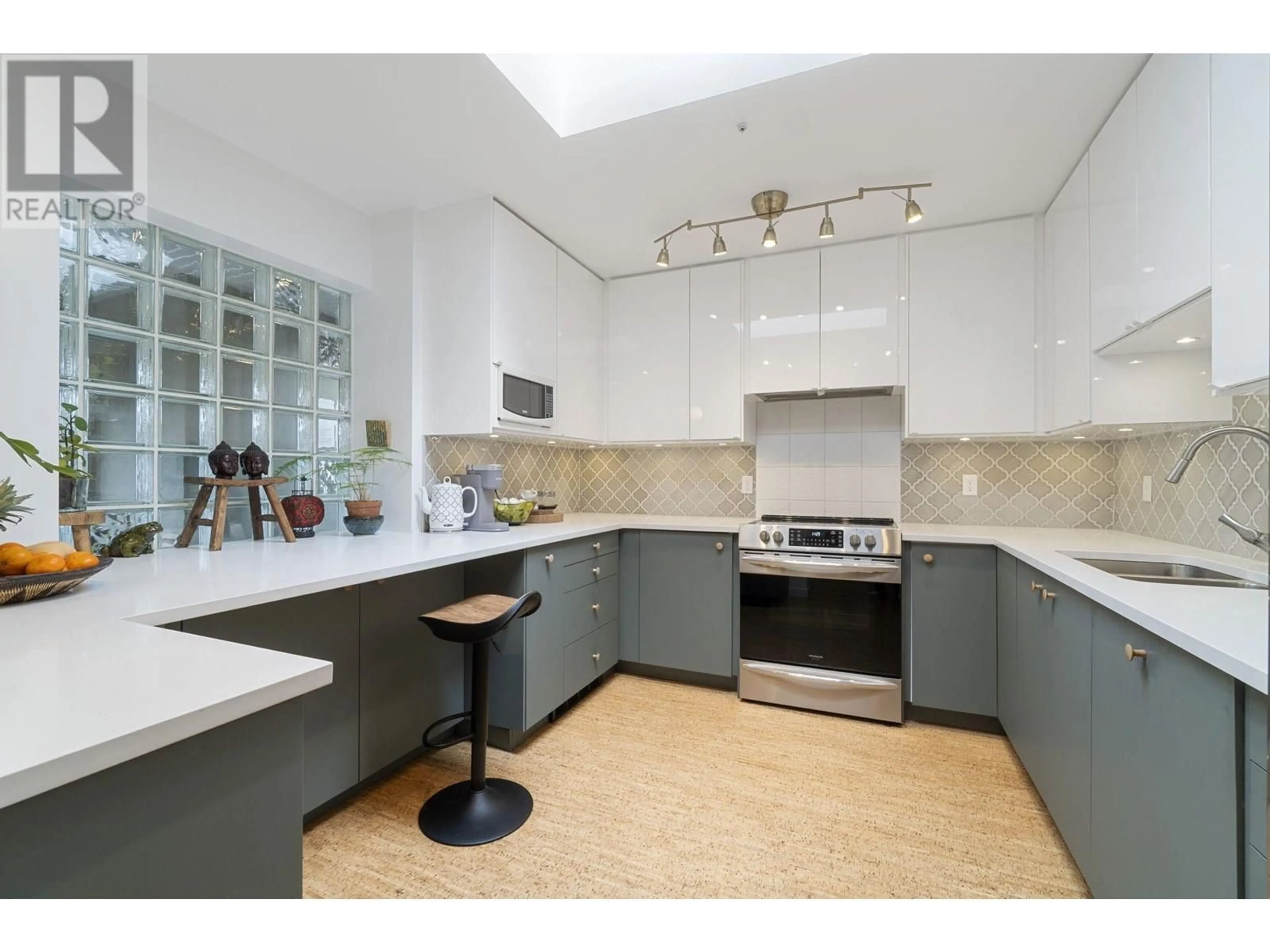 Contemporary kitchen, ceramic/tile floor for 402 - 4688 10TH AVENUE, Vancouver British Columbia V6R2J5
