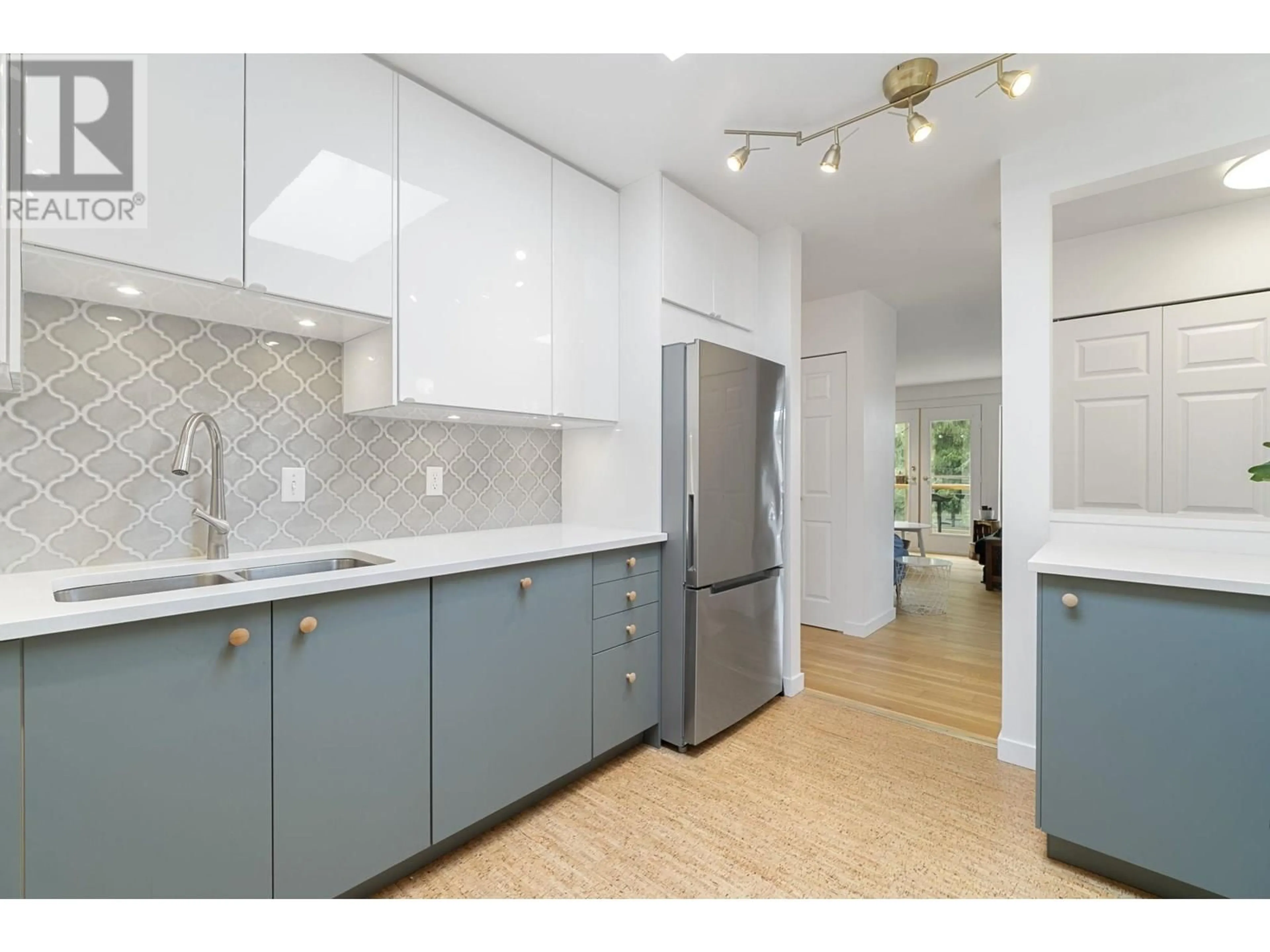 Open concept kitchen, unknown for 402 - 4688 10TH AVENUE, Vancouver British Columbia V6R2J5