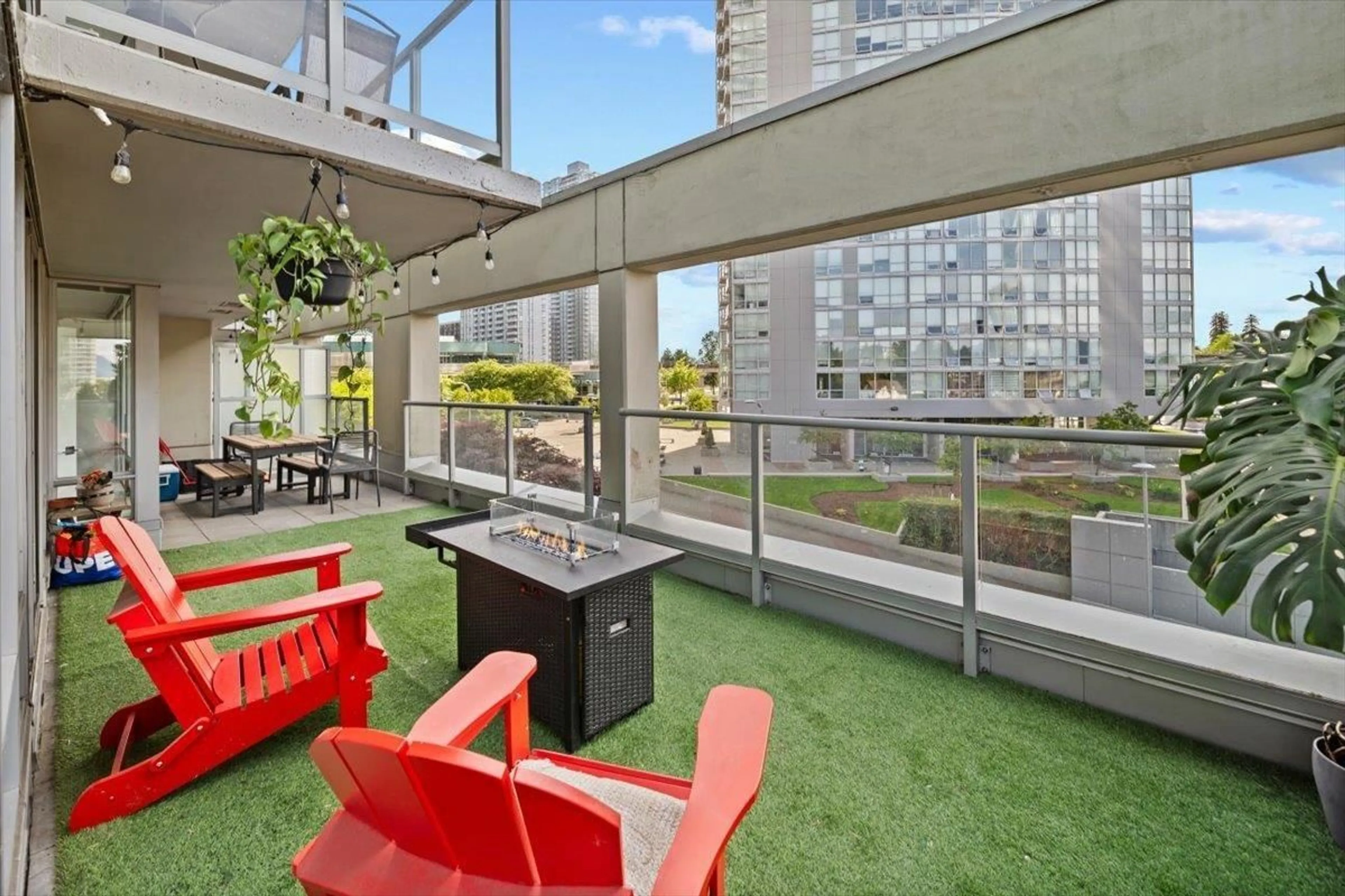 Patio, city buildings view from balcony for 204 - 13688 100, Surrey British Columbia V3T0G5