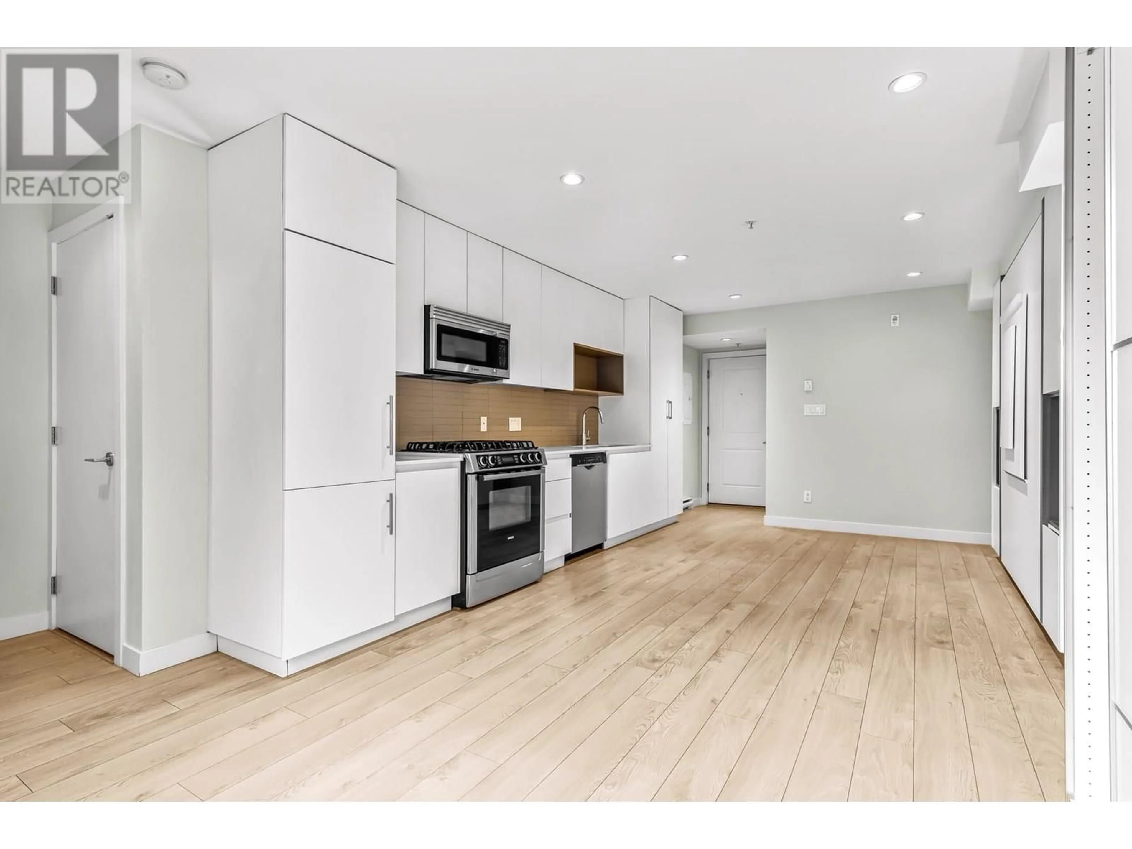 Open concept kitchen, wood/laminate floor for 2238 ALDER STREET, Vancouver British Columbia V6H2R9