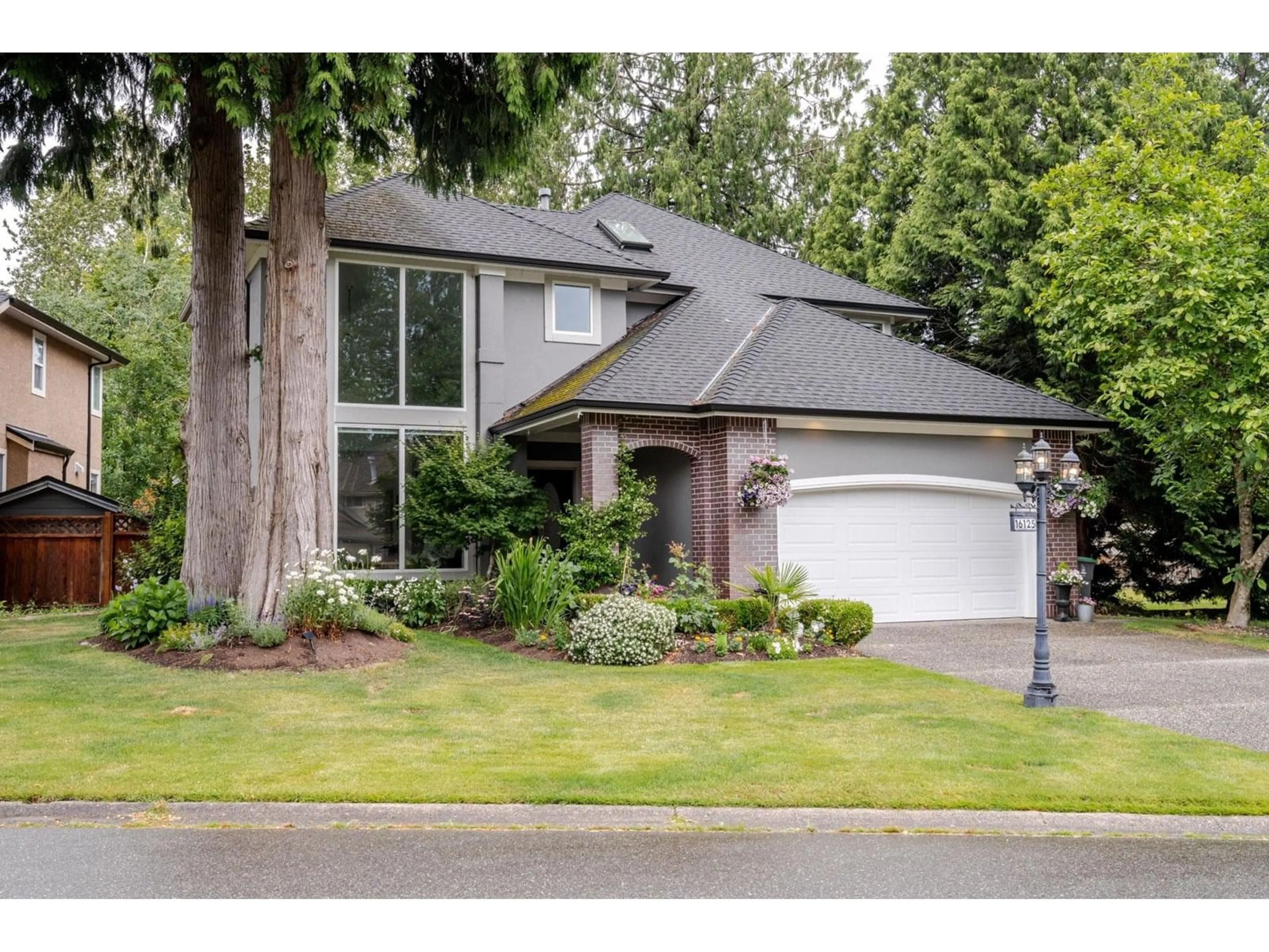 Home with brick exterior material, street for 16125 108A, Surrey British Columbia V4N1P1