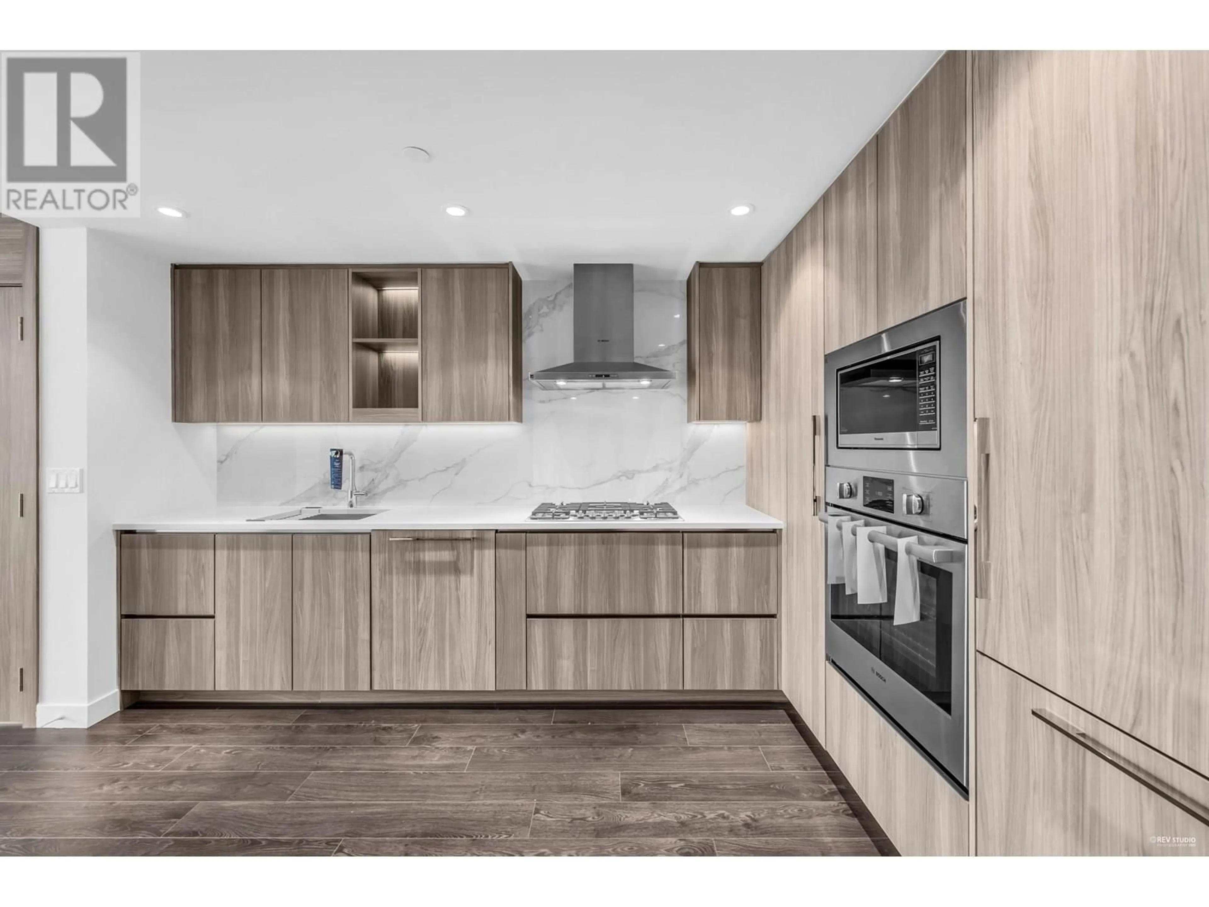 Open concept kitchen, wood/laminate floor for 815 - 8611 HAZELBRIDGE WAY, Richmond British Columbia V6X0W8