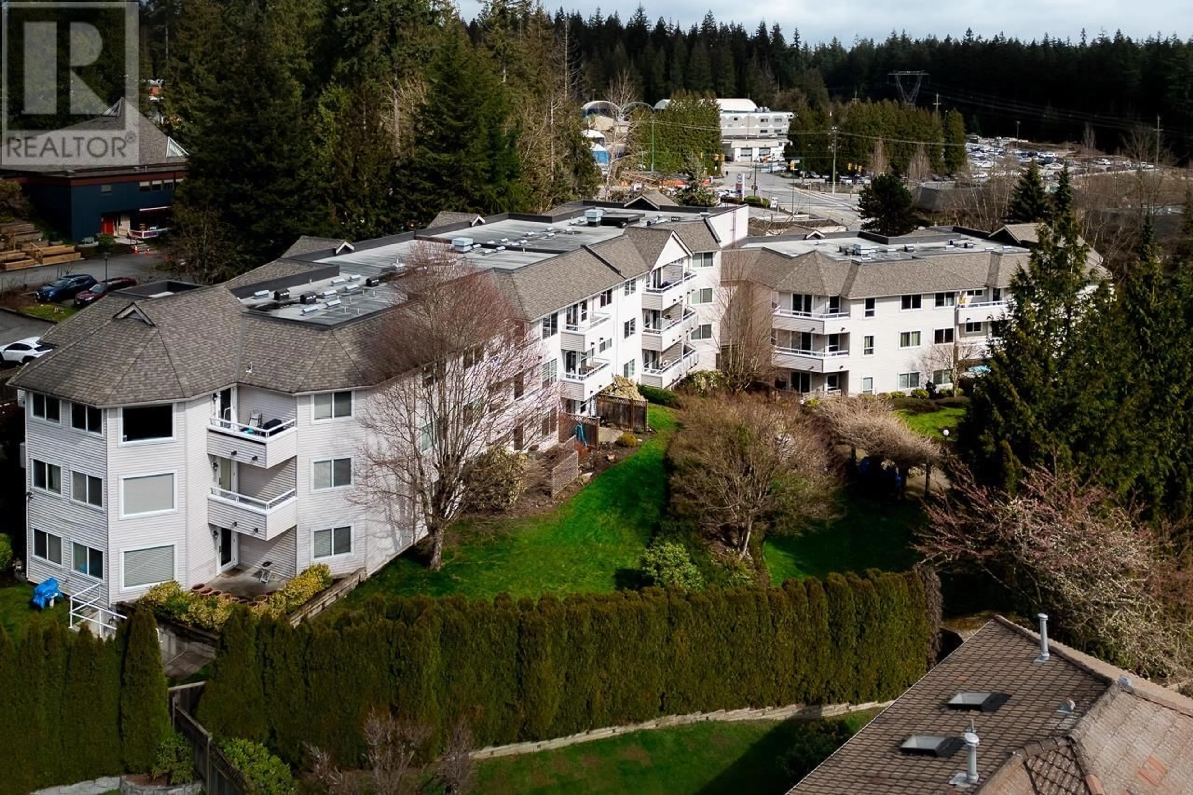 A pic from outside/outdoor area/front of a property/back of a property/a pic from drone, mountain view for 306 - 450 BROMLEY STREET, Coquitlam British Columbia V3K6S5
