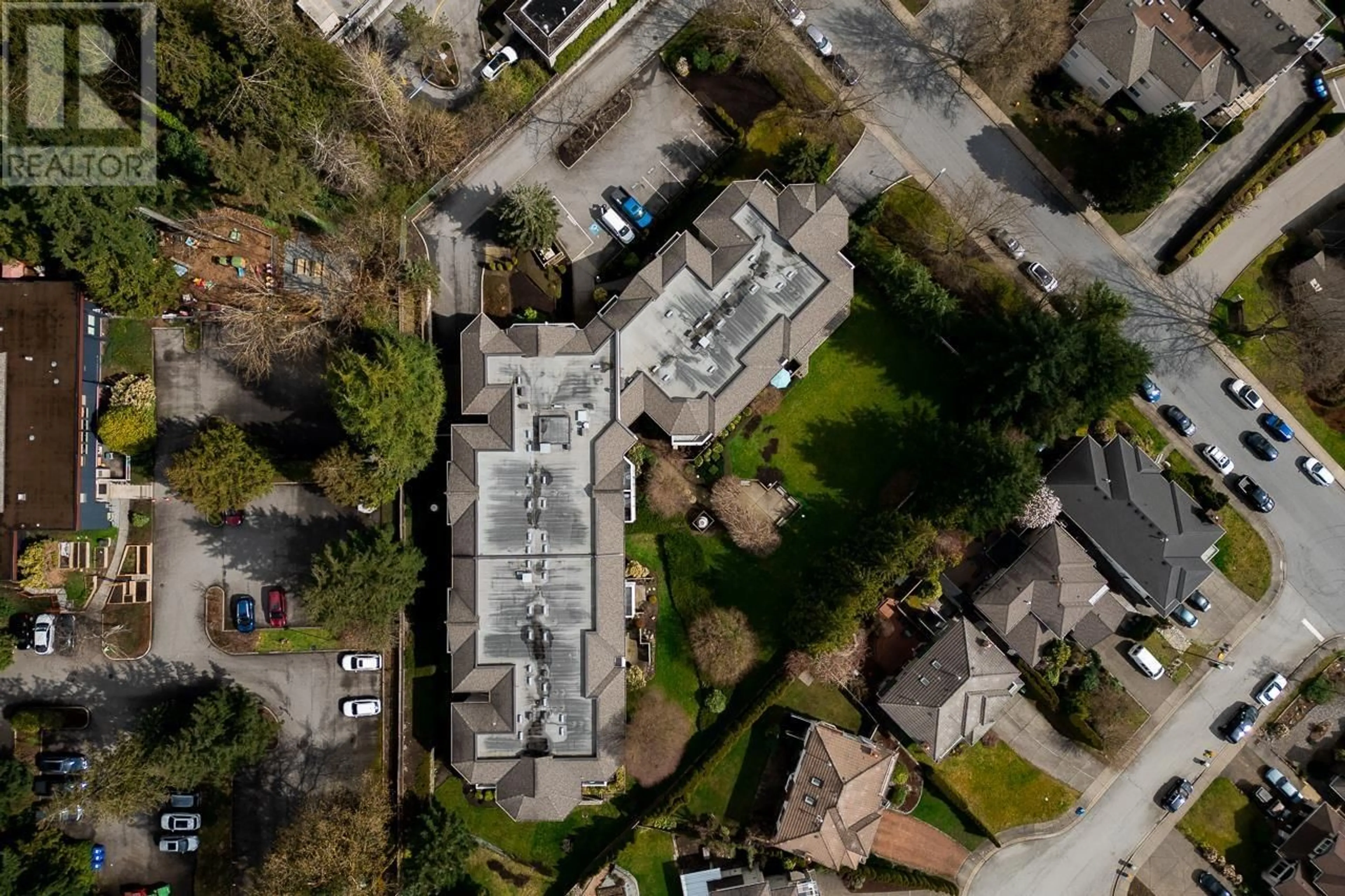 A pic from outside/outdoor area/front of a property/back of a property/a pic from drone, street for 306 - 450 BROMLEY STREET, Coquitlam British Columbia V3K6S5