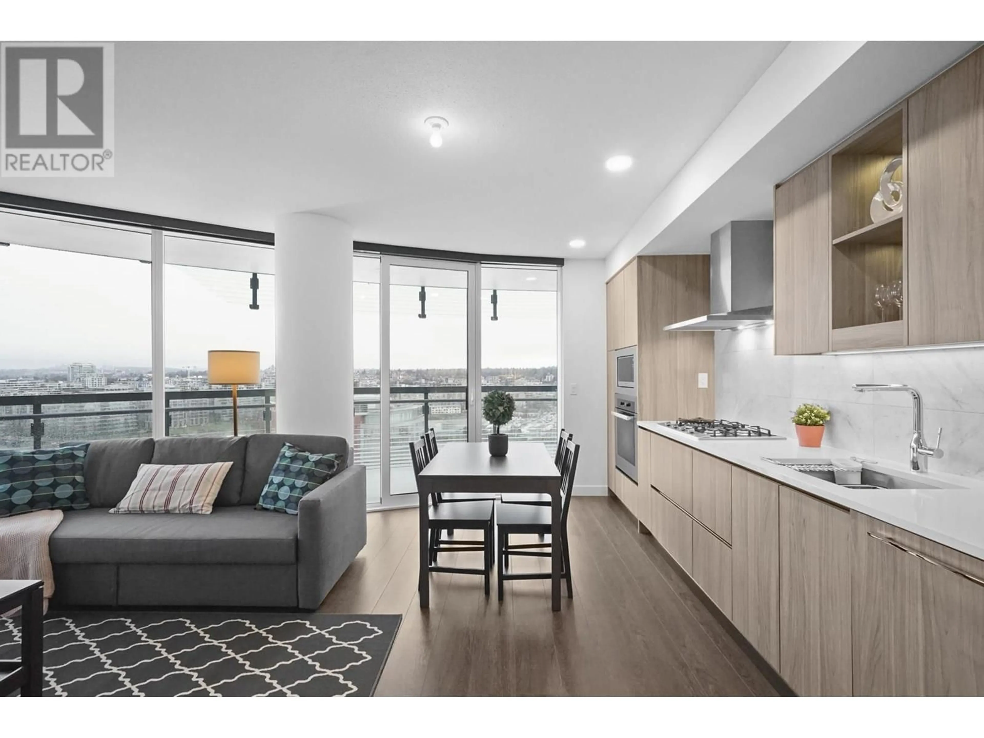 Open concept kitchen, wood/laminate floor for 1884 - 87 NELSON STREET, Vancouver British Columbia V6Z0E8