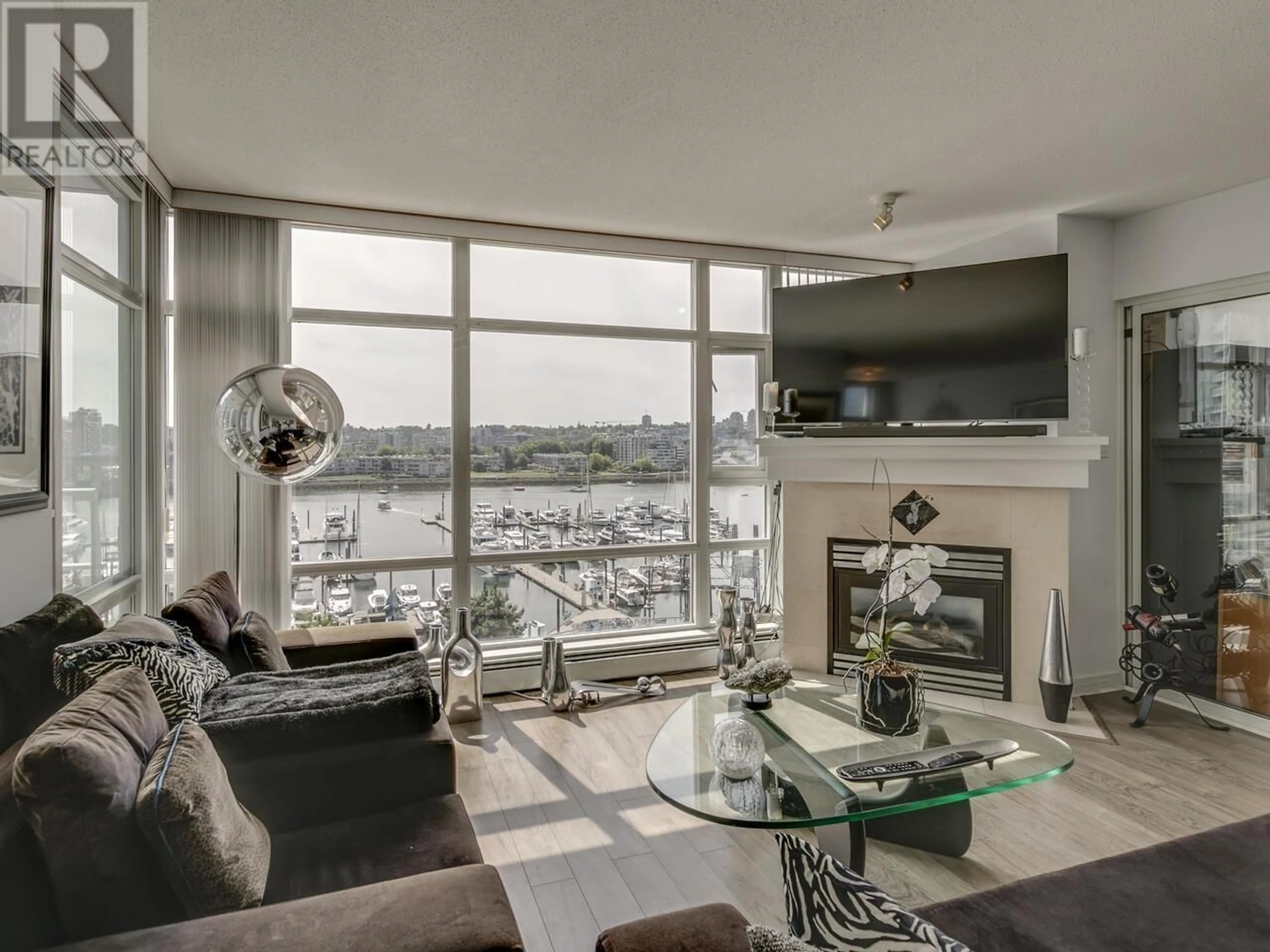 Living room with furniture, unknown for 802 - 1199 MARINASIDE CRESCENT, Vancouver British Columbia V6Z2Y2