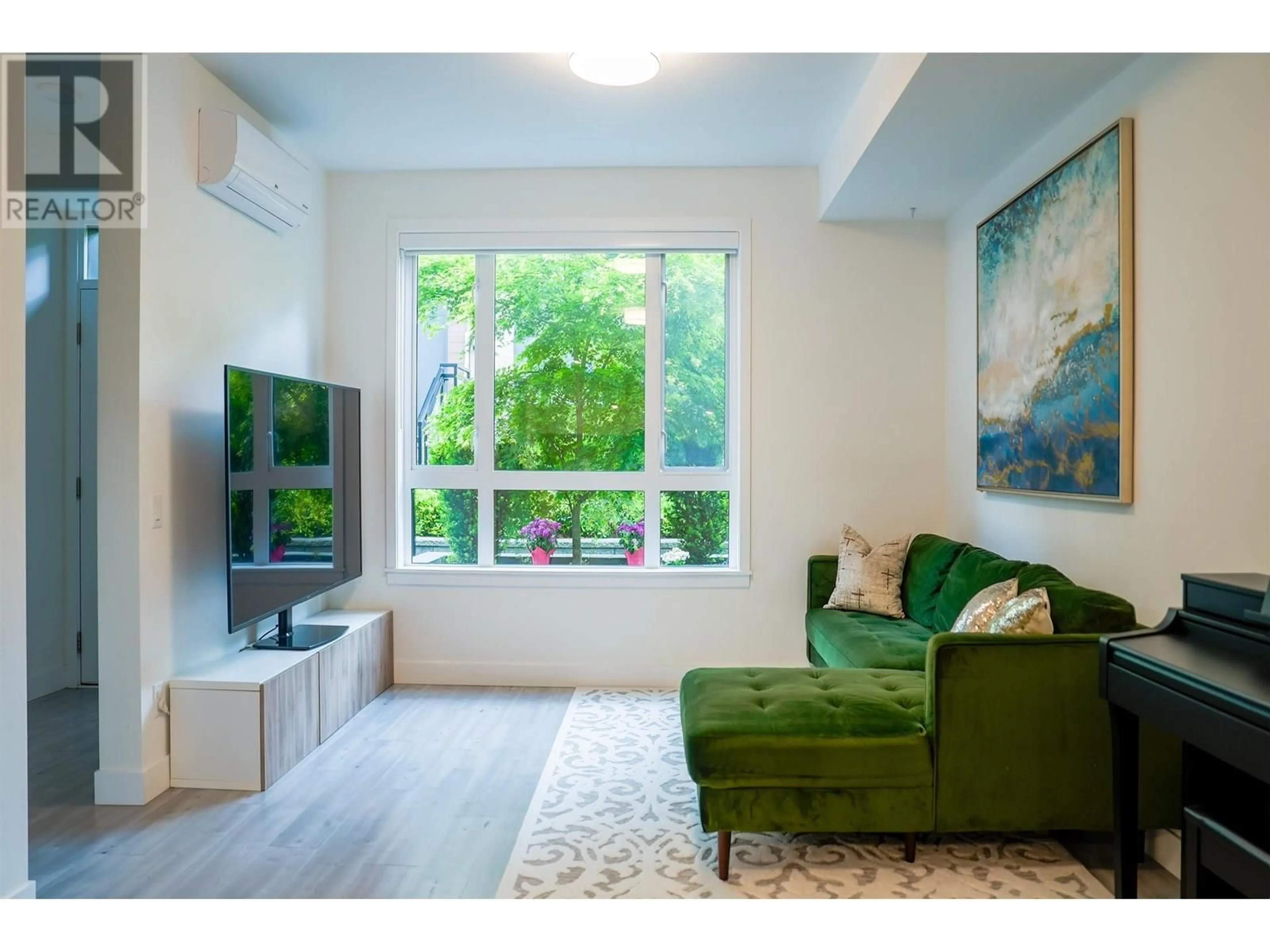 Living room with furniture, wood/laminate floor for 136 - 2035 GLENAIRE DRIVE, North Vancouver British Columbia V7P1Y2