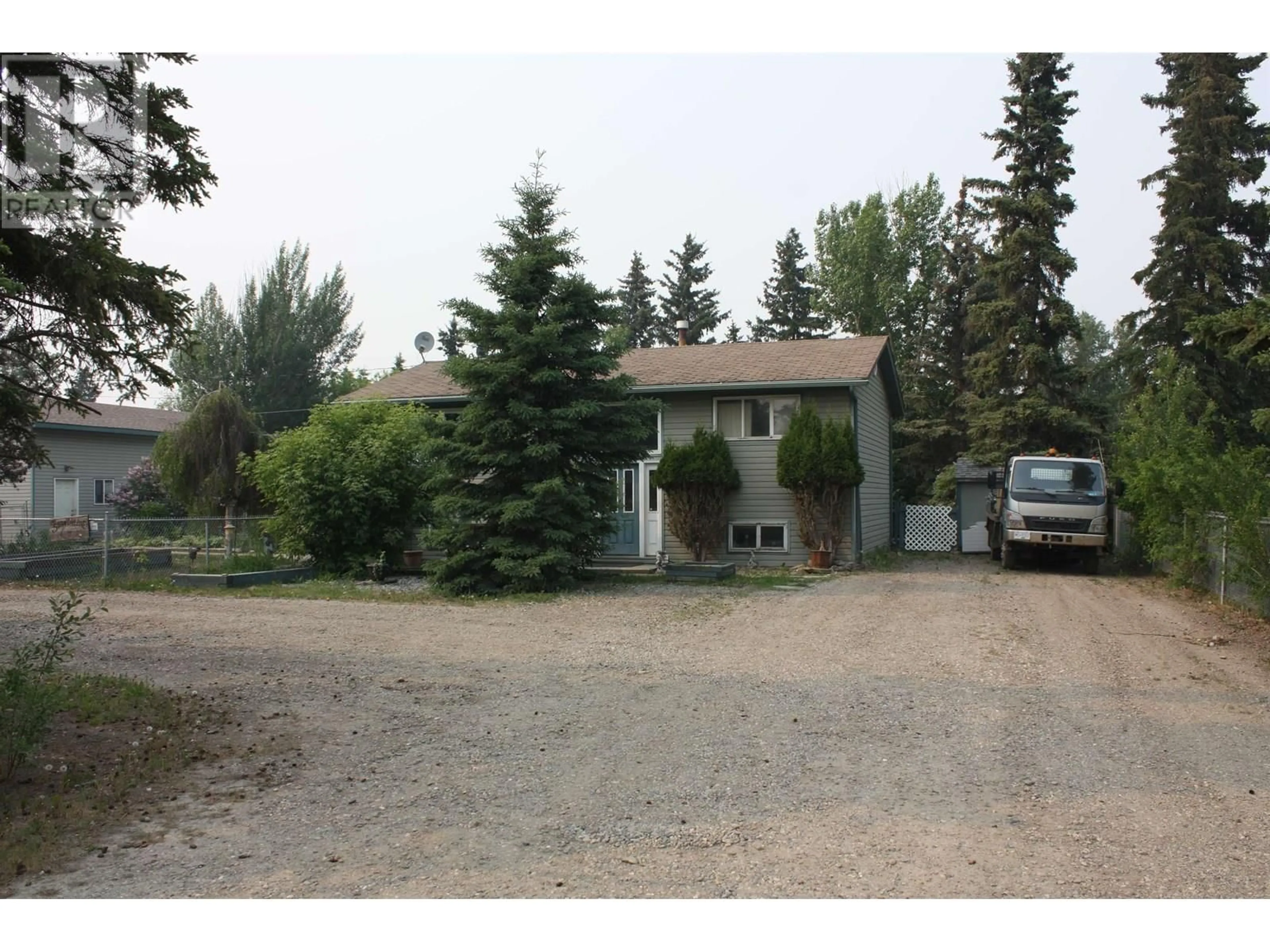 A pic from outside/outdoor area/front of a property/back of a property/a pic from drone, street for 12282 JUNIPER AVENUE, Fort St. John British Columbia V0C1C0