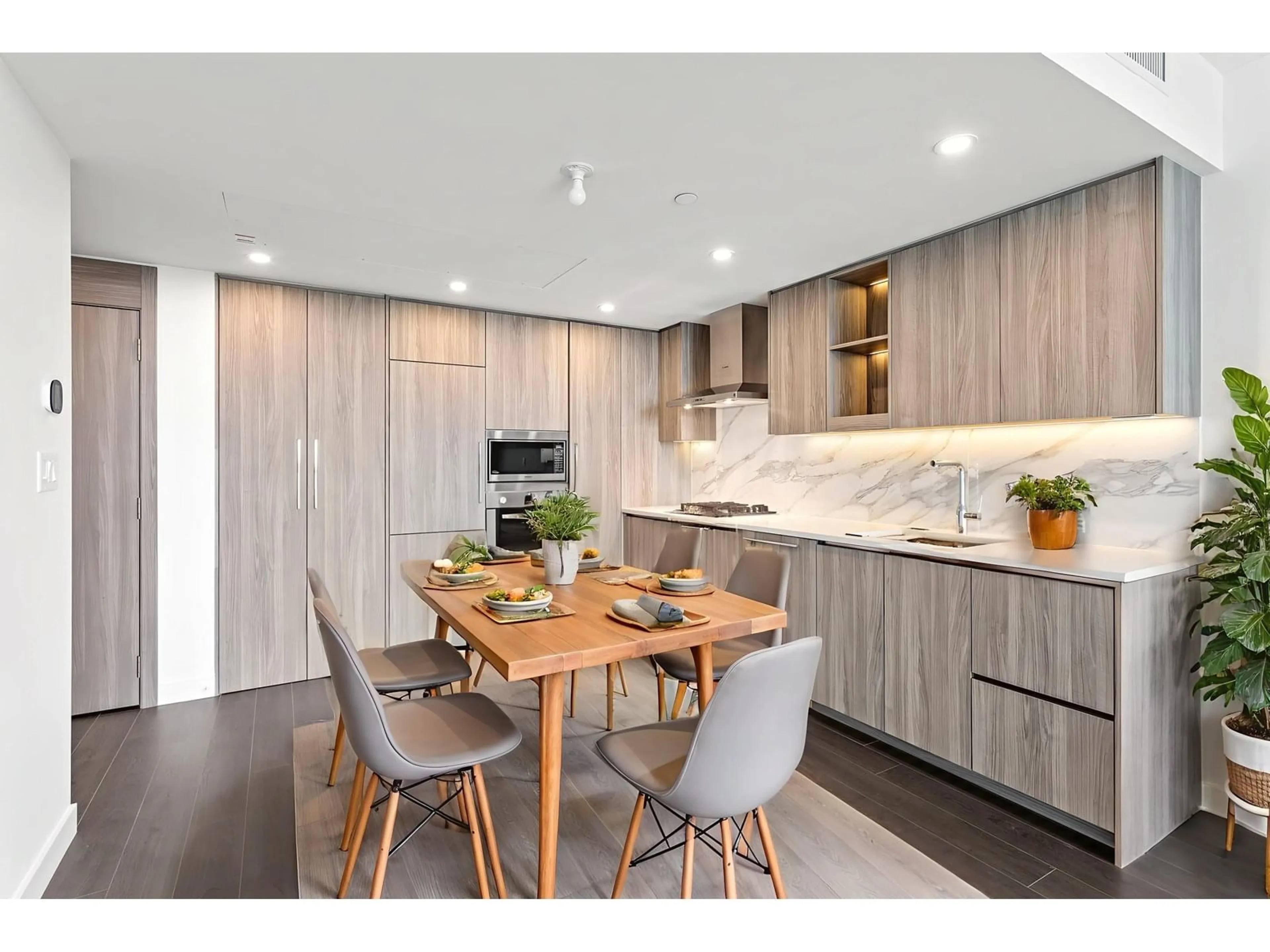 Contemporary kitchen, wood/laminate floor for 1506 - 13788 100, Surrey British Columbia V3T0V3