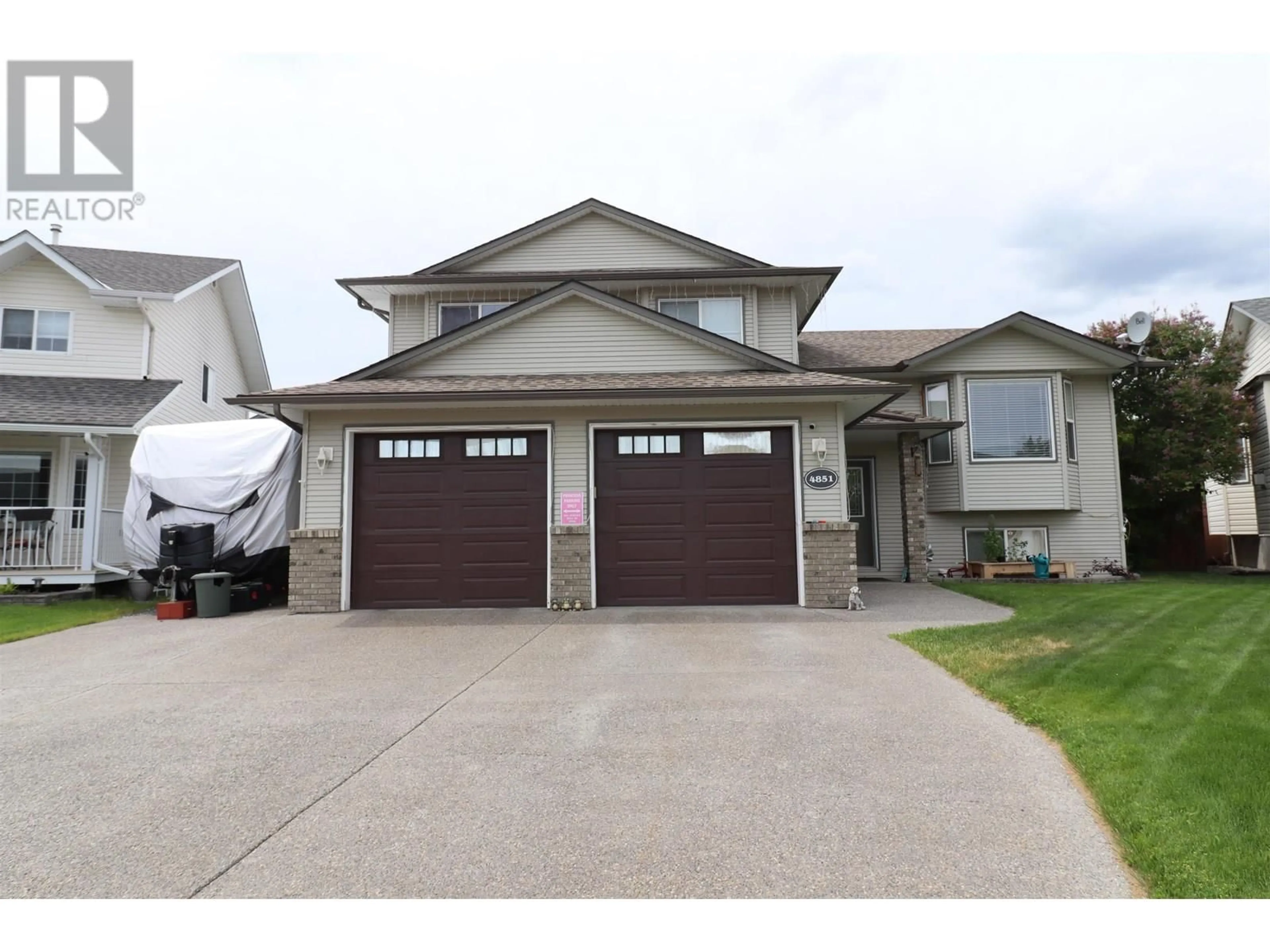 Home with vinyl exterior material, street for 4851 STROM PLACE, Prince George British Columbia V2M7E4