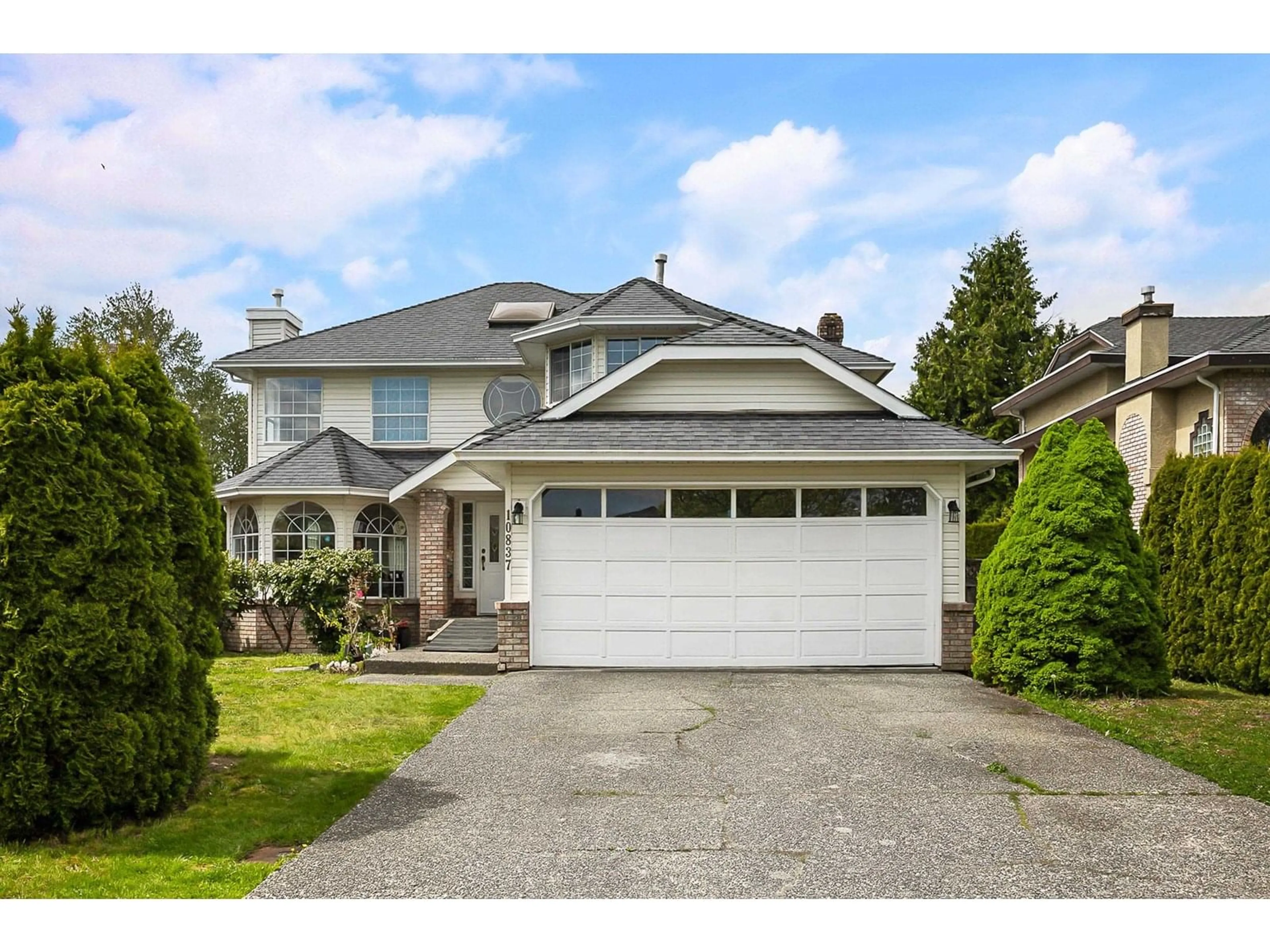 Home with vinyl exterior material, street for 10837 155A, Surrey British Columbia V3R0H7