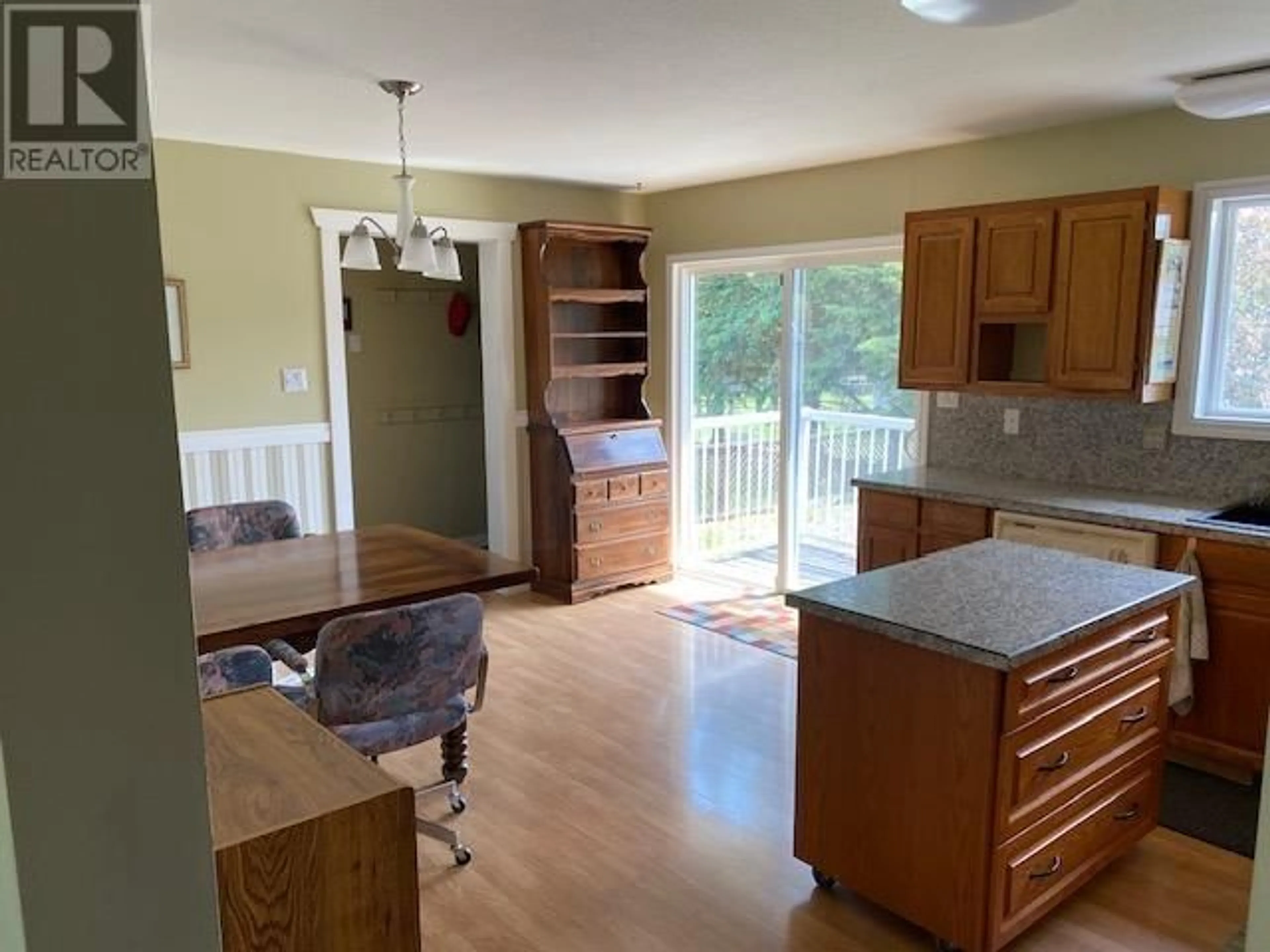 Open concept kitchen, wood/laminate floor for 360 SEYFORTH DRIVE, Vanderhoof British Columbia V0J3A2