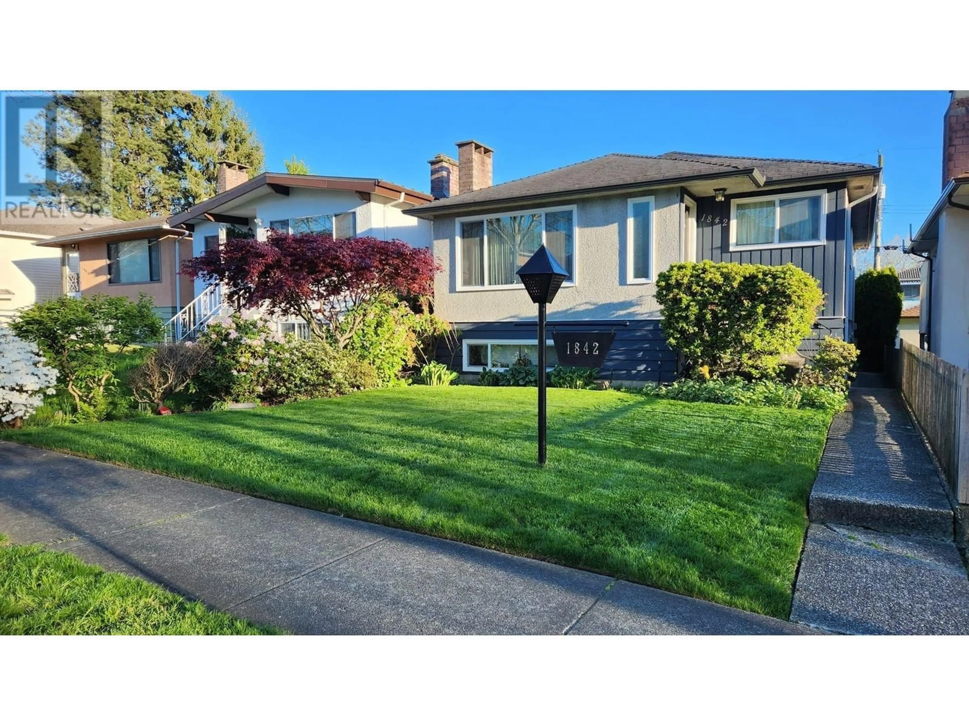 Home with vinyl exterior material, street for 1842 51ST AVENUE, Vancouver British Columbia V5P1V9