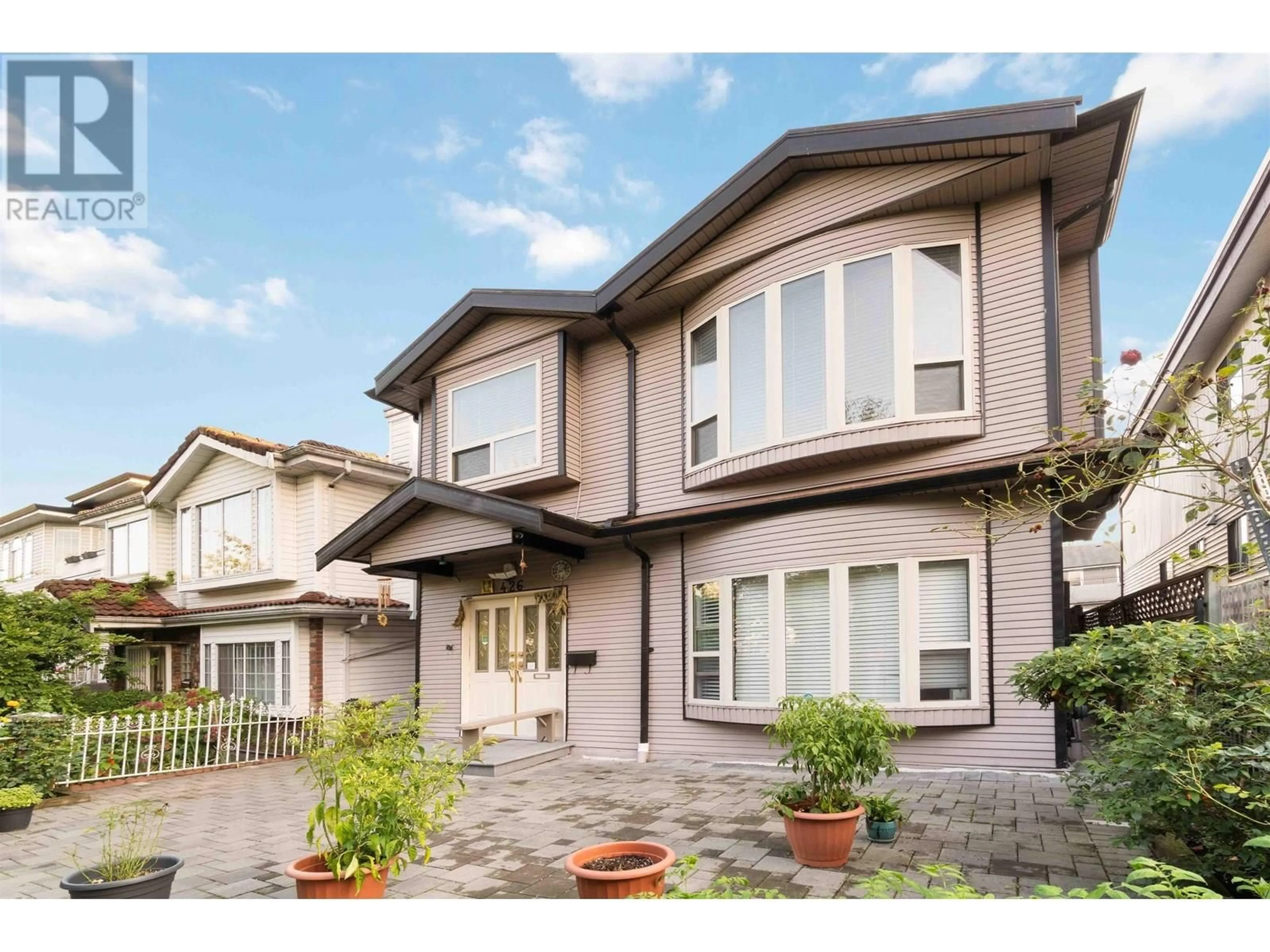 Home with brick exterior material, street for 426 18TH AVENUE, Vancouver British Columbia V5V1G1