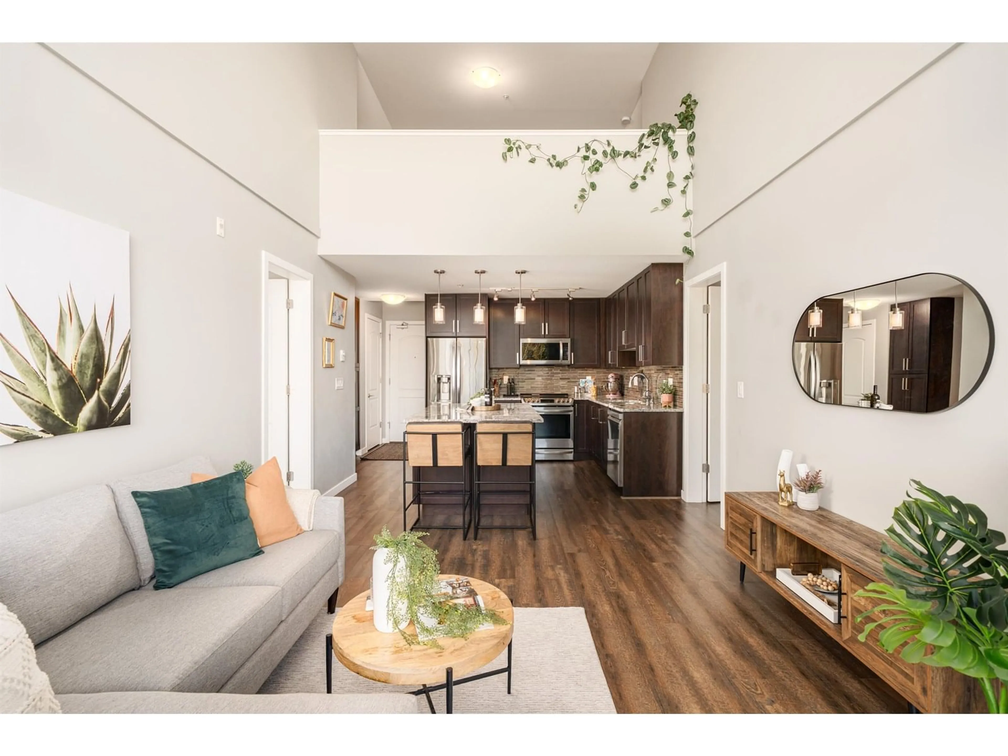 Open concept kitchen, wood/laminate floor for 406 - 6490 194, Surrey British Columbia V4N6J9