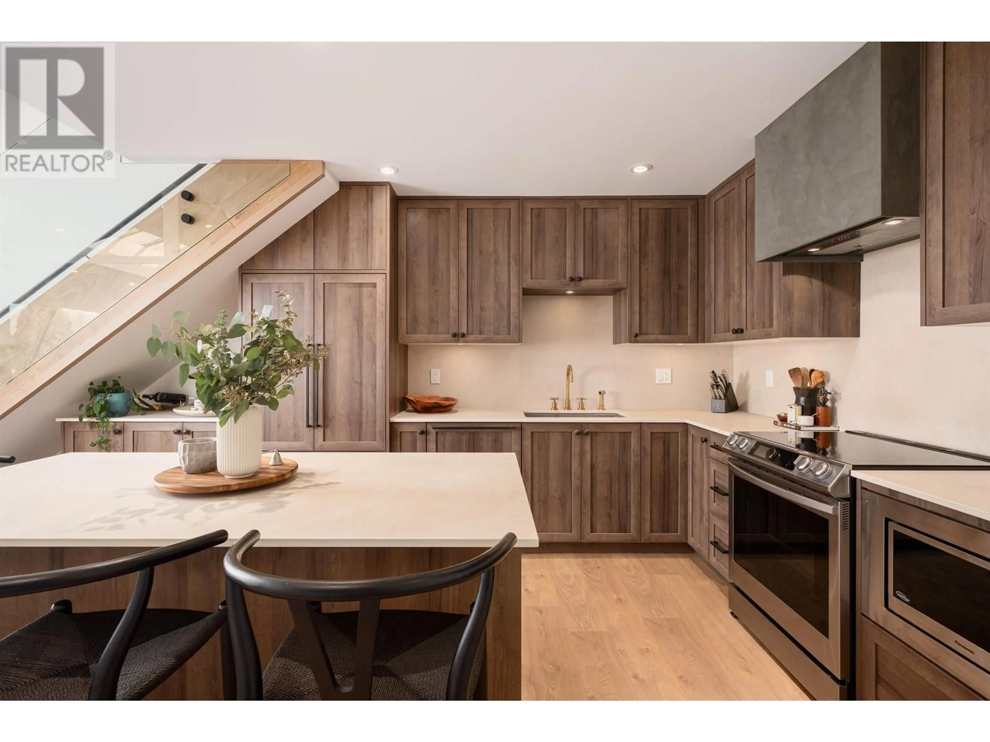 Open concept kitchen, wood/laminate floor for 309 - 2410 CORNWALL AVENUE, Vancouver British Columbia V6K1B8