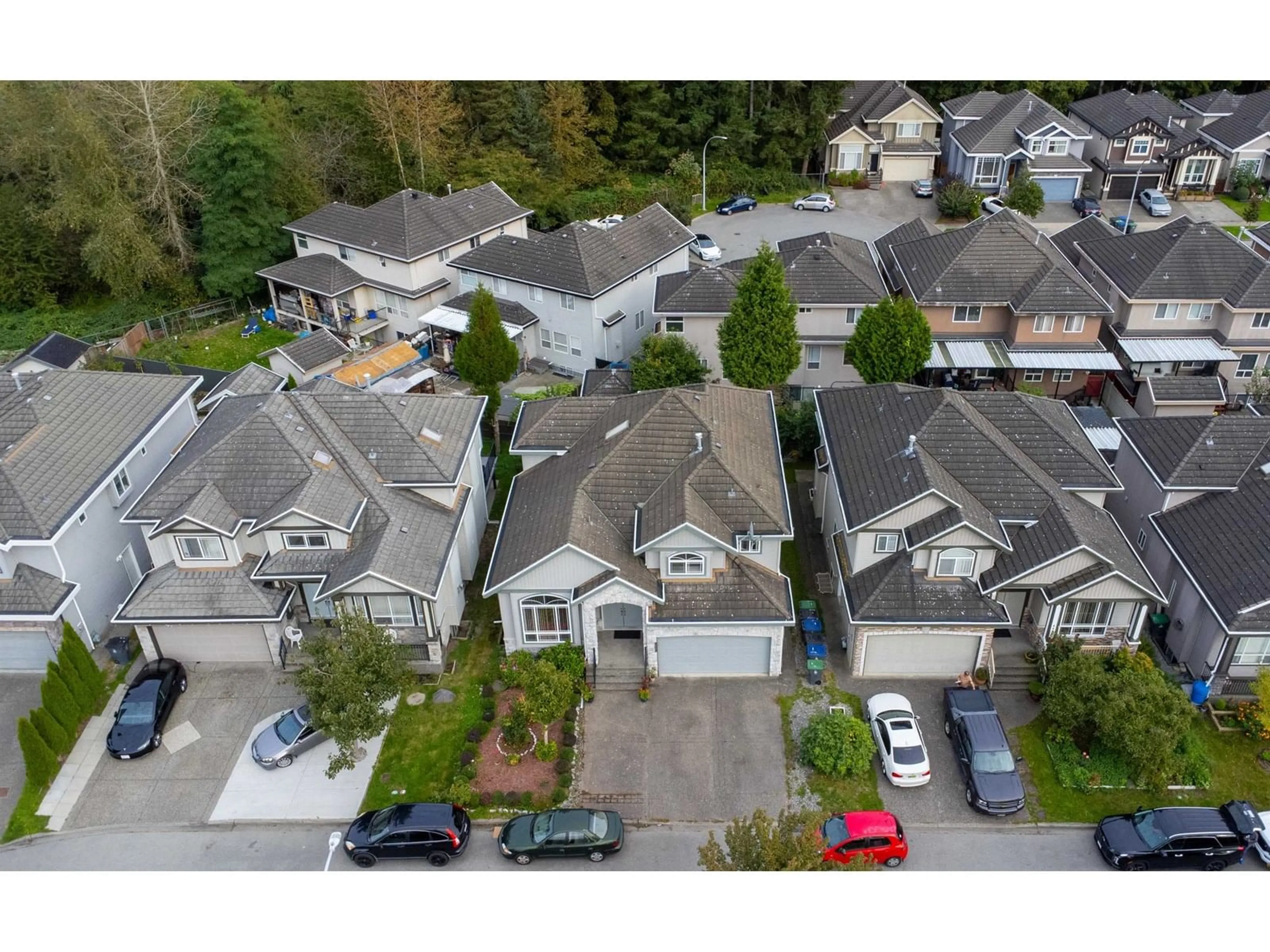 A pic from outside/outdoor area/front of a property/back of a property/a pic from drone, street for 8358 144, Surrey British Columbia V3W5T5