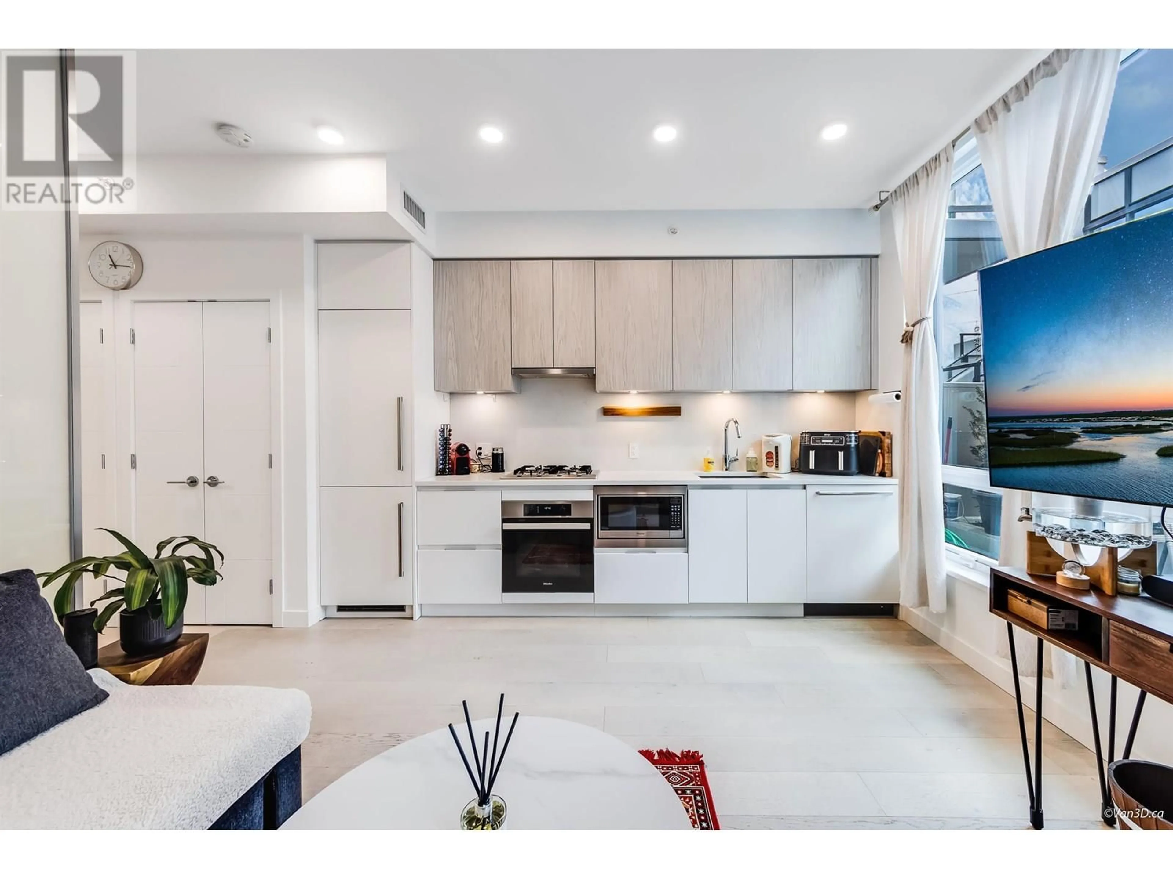 Open concept kitchen, ceramic/tile floor for 102 - 4240 CAMBIE STREET, Vancouver British Columbia V5Z0K6