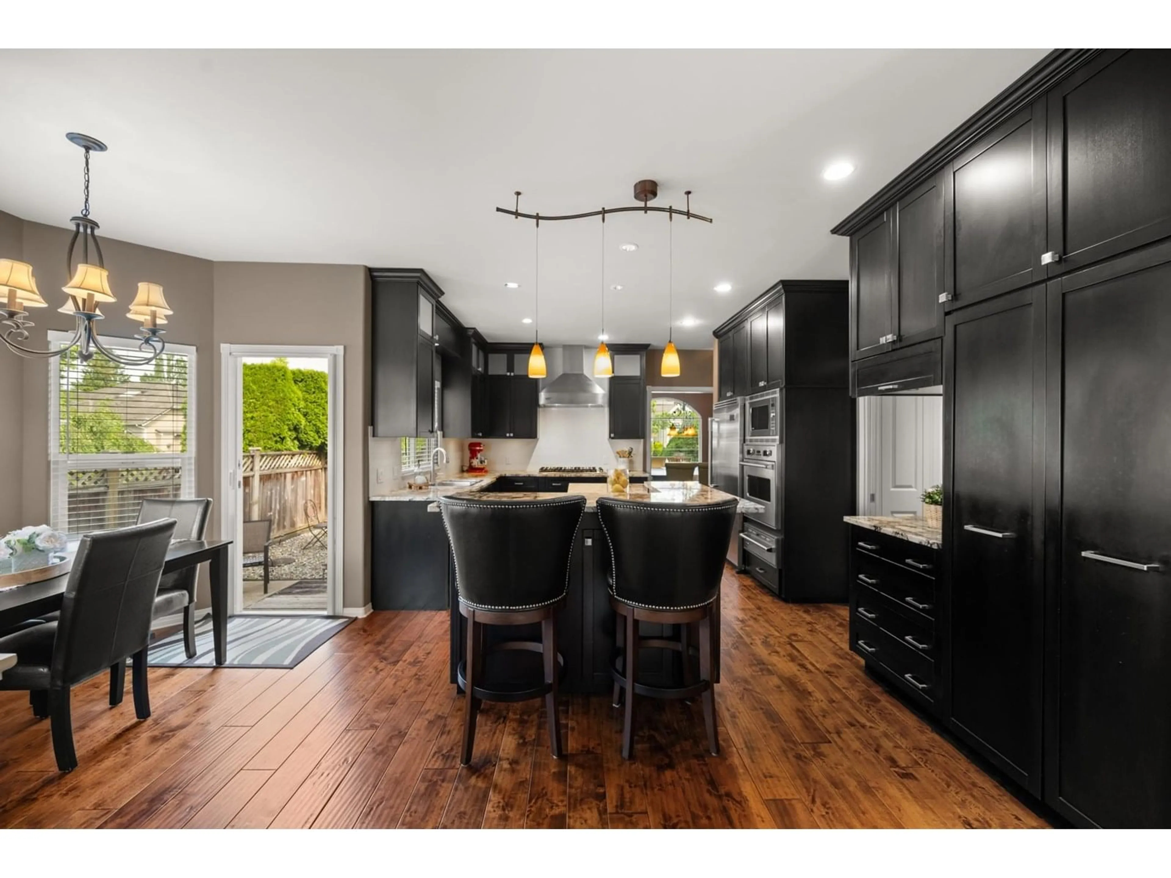 Open concept kitchen, wood/laminate floor for 18590 63A, Surrey British Columbia V3S8J5