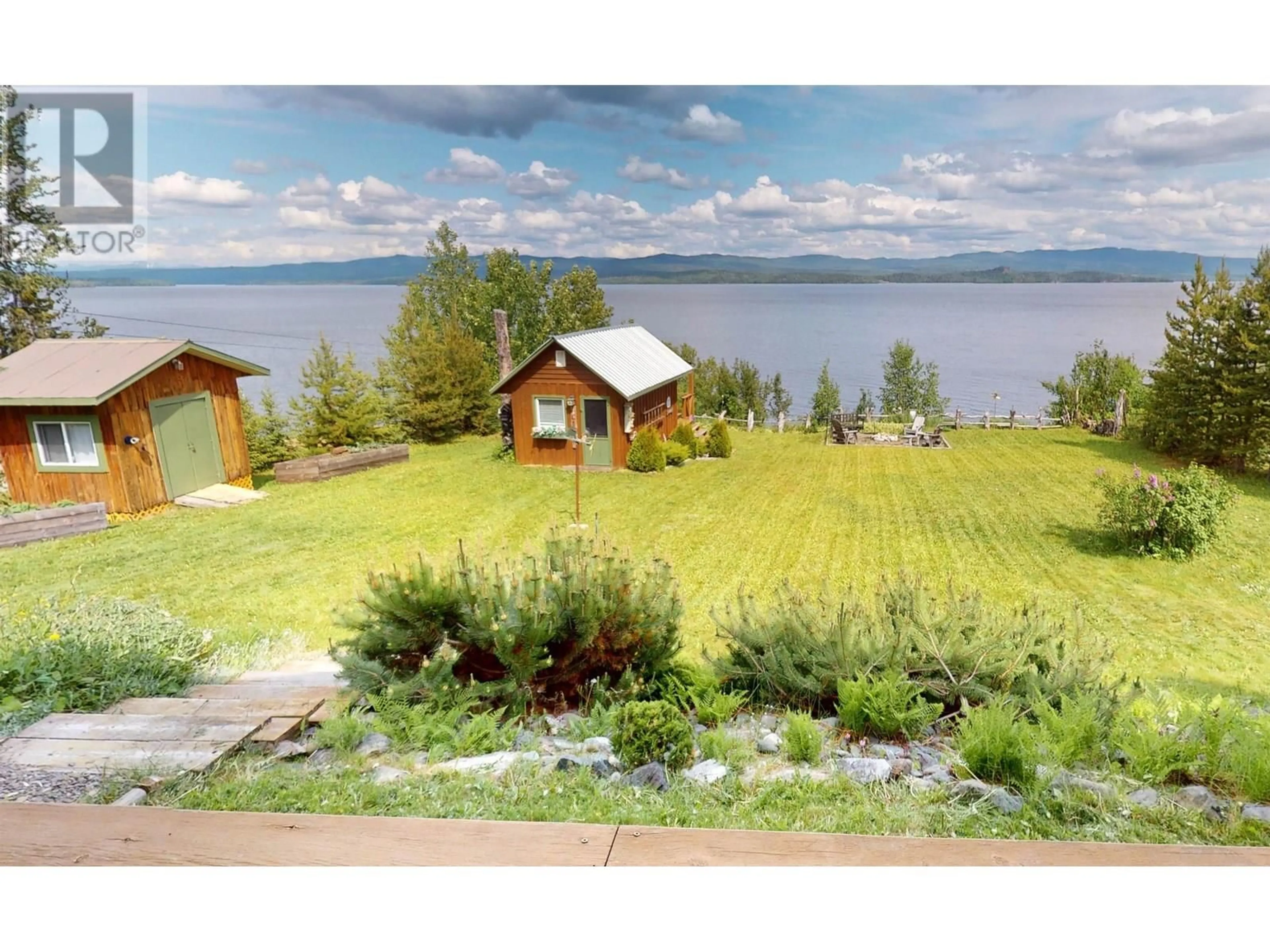 A pic from outside/outdoor area/front of a property/back of a property/a pic from drone, water/lake/river/ocean view for 54456 118 HIGHWAY, Granisle British Columbia V0J1W0