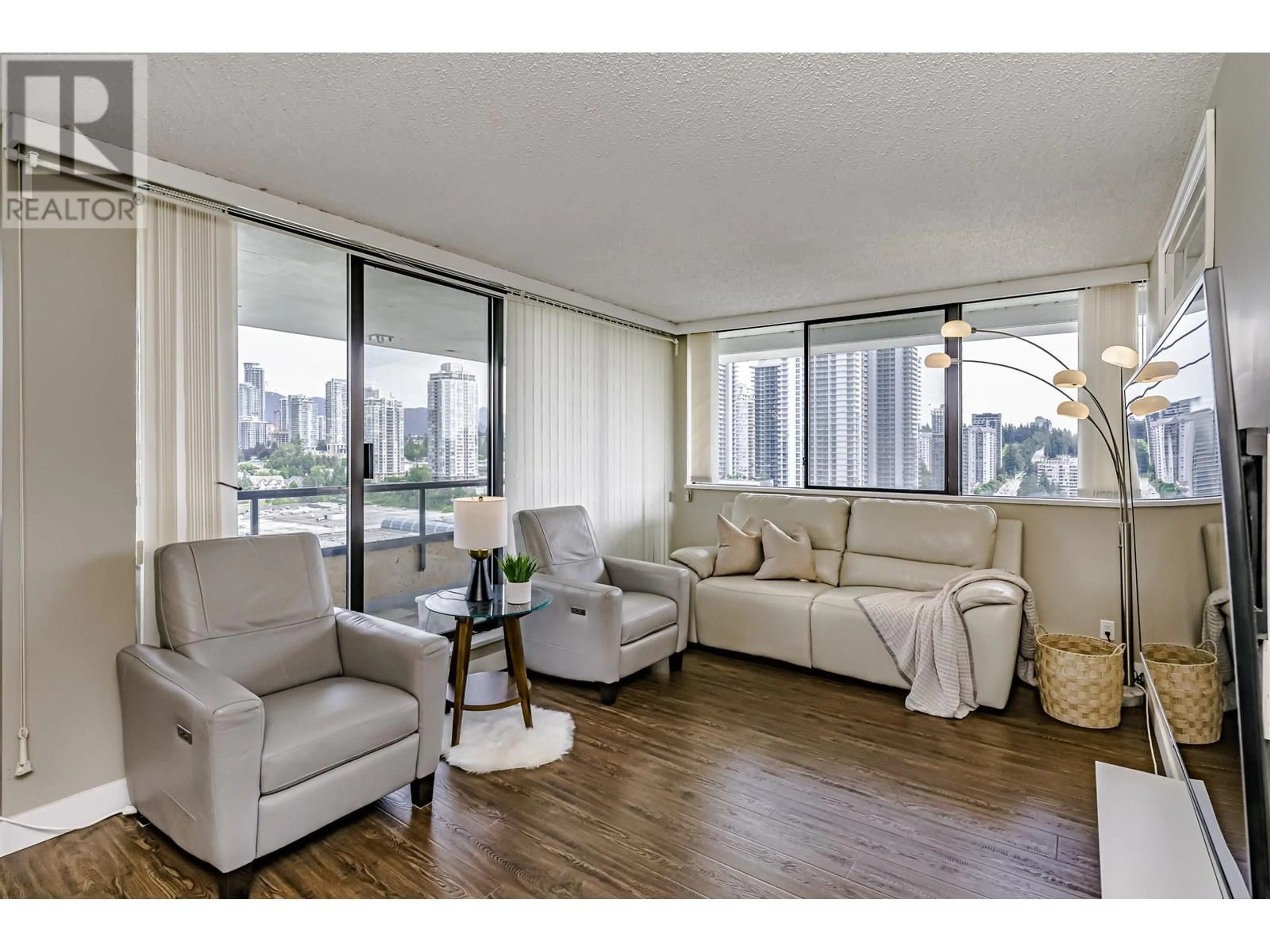 Living room with furniture, wood/laminate floor for 2403 - 9521 CARDSTON, Burnaby British Columbia V3N4R8
