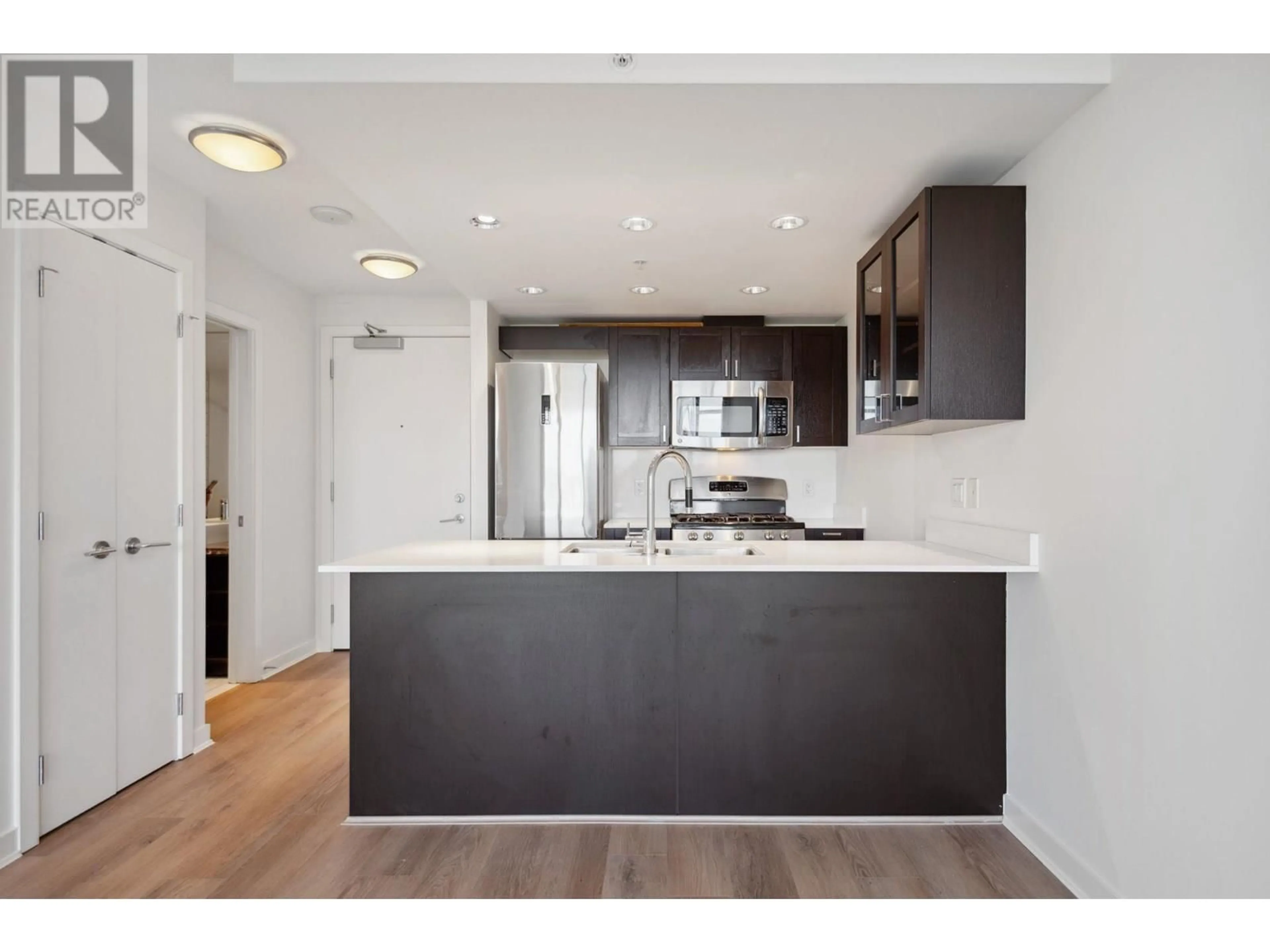 Open concept kitchen, wood/laminate floor for 813 - 4818 ELDORADO MEWS, Vancouver British Columbia V5R0B3