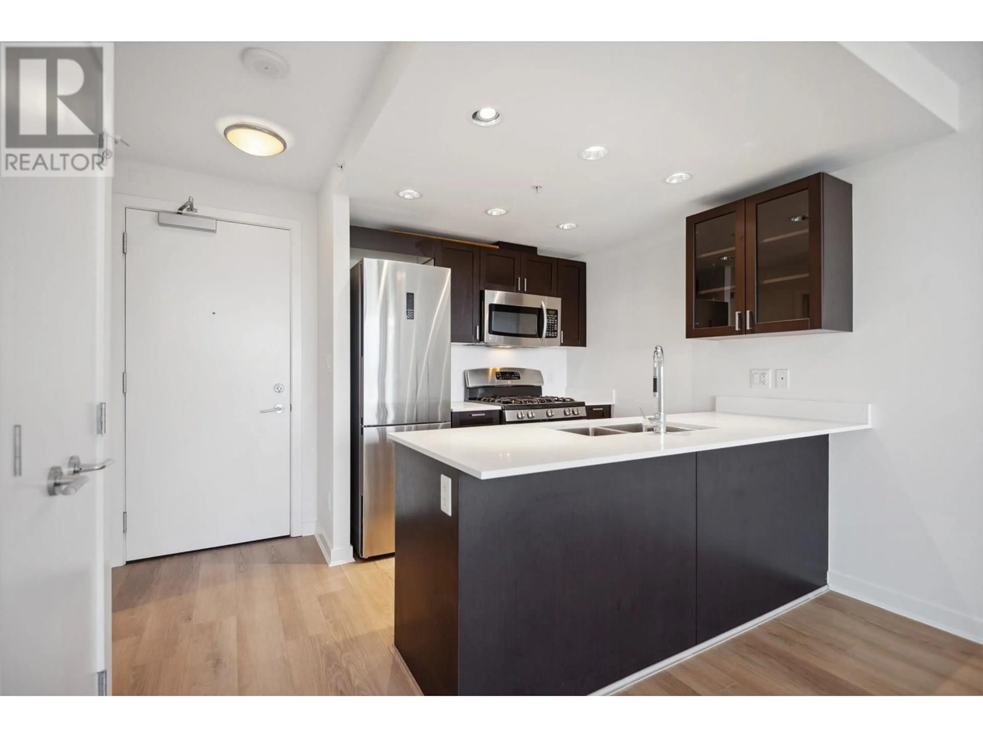 Open concept kitchen, wood/laminate floor for 813 - 4818 ELDORADO MEWS, Vancouver British Columbia V5R0B3