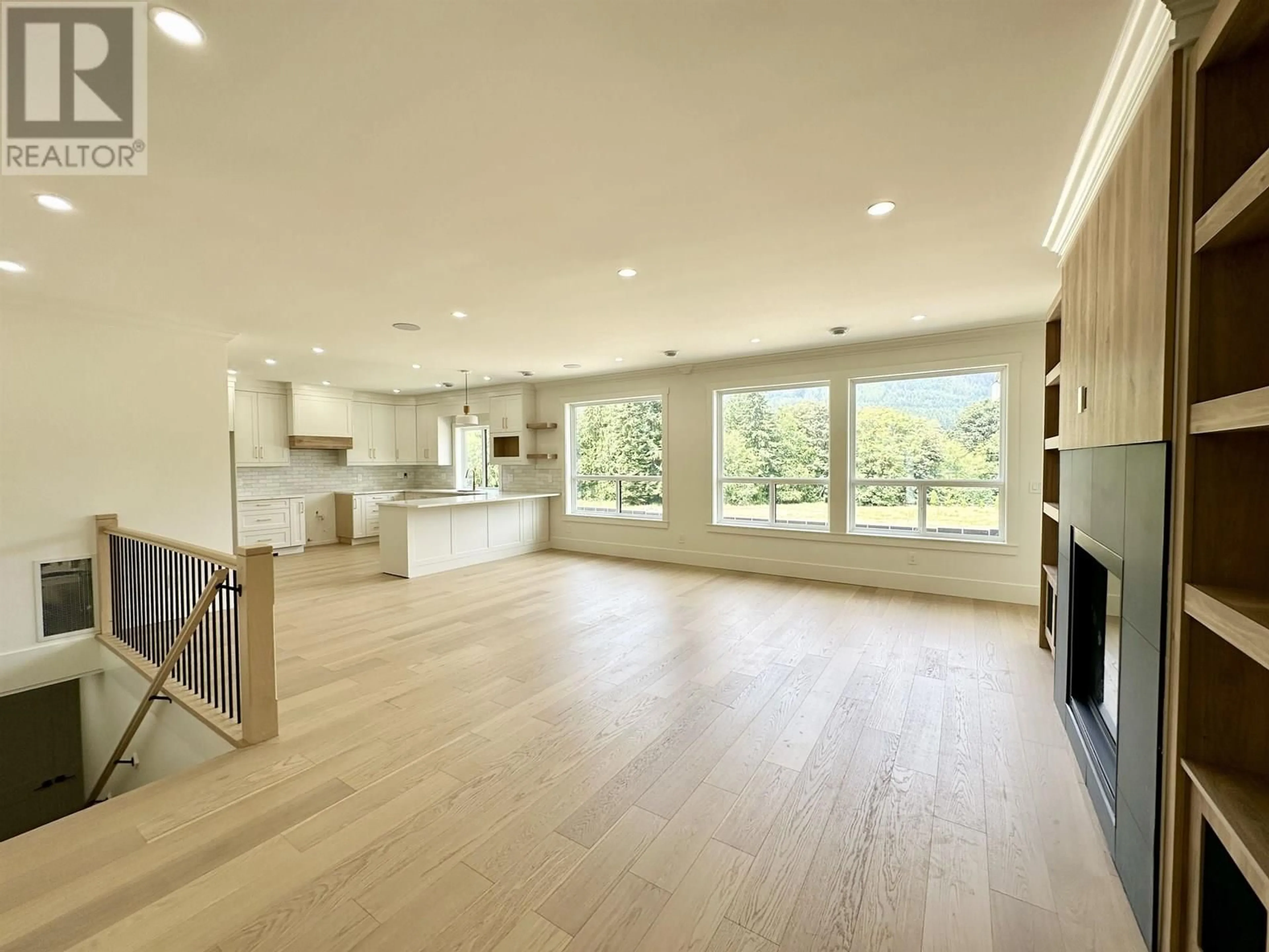 Open concept kitchen, wood/laminate floor for 1203 CASTLE ROAD, Gibsons British Columbia V0N1V5