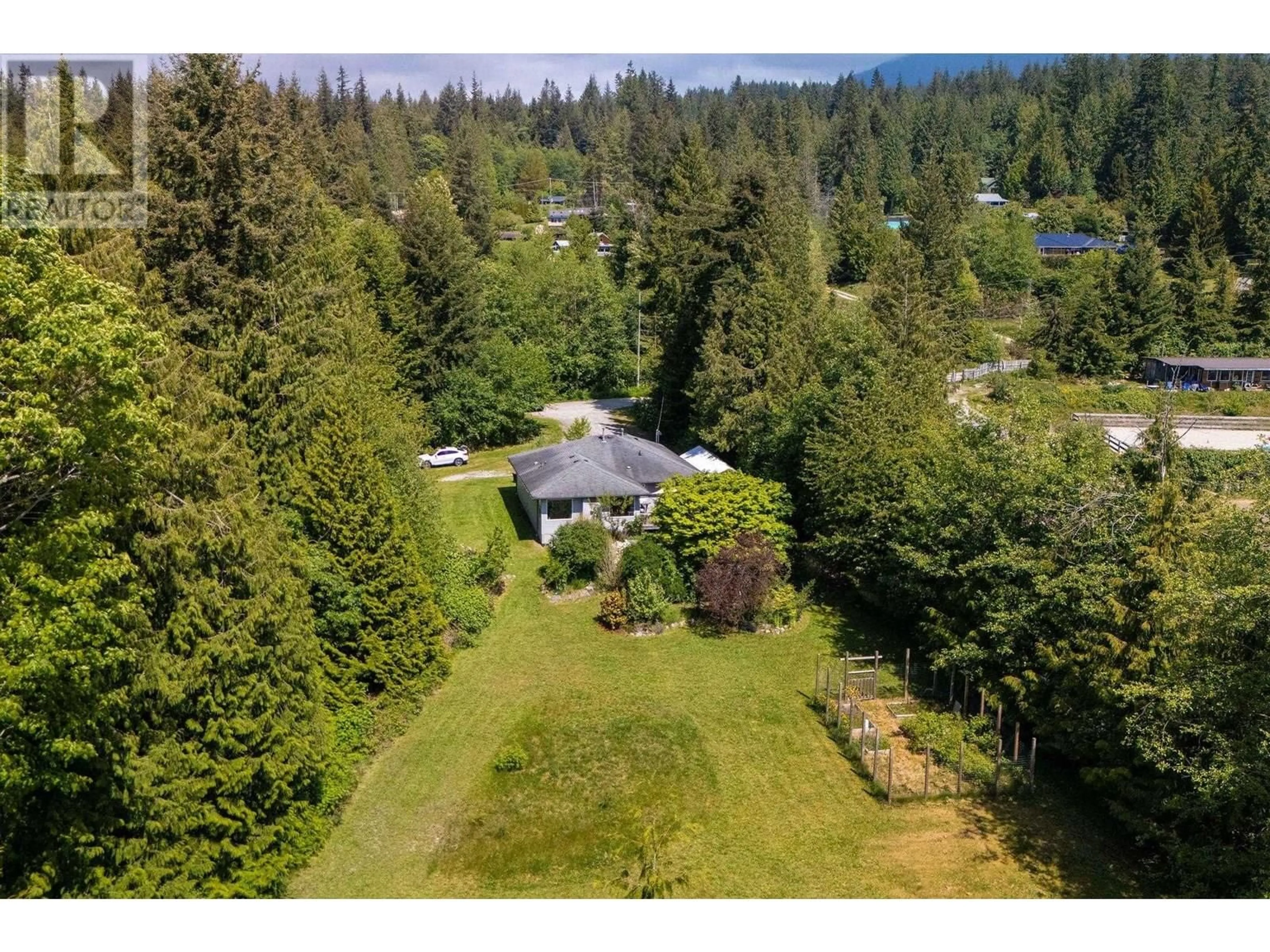 A pic from outside/outdoor area/front of a property/back of a property/a pic from drone, forest/trees view for 2557 MILES ROAD, Roberts Creek British Columbia V0N2W4