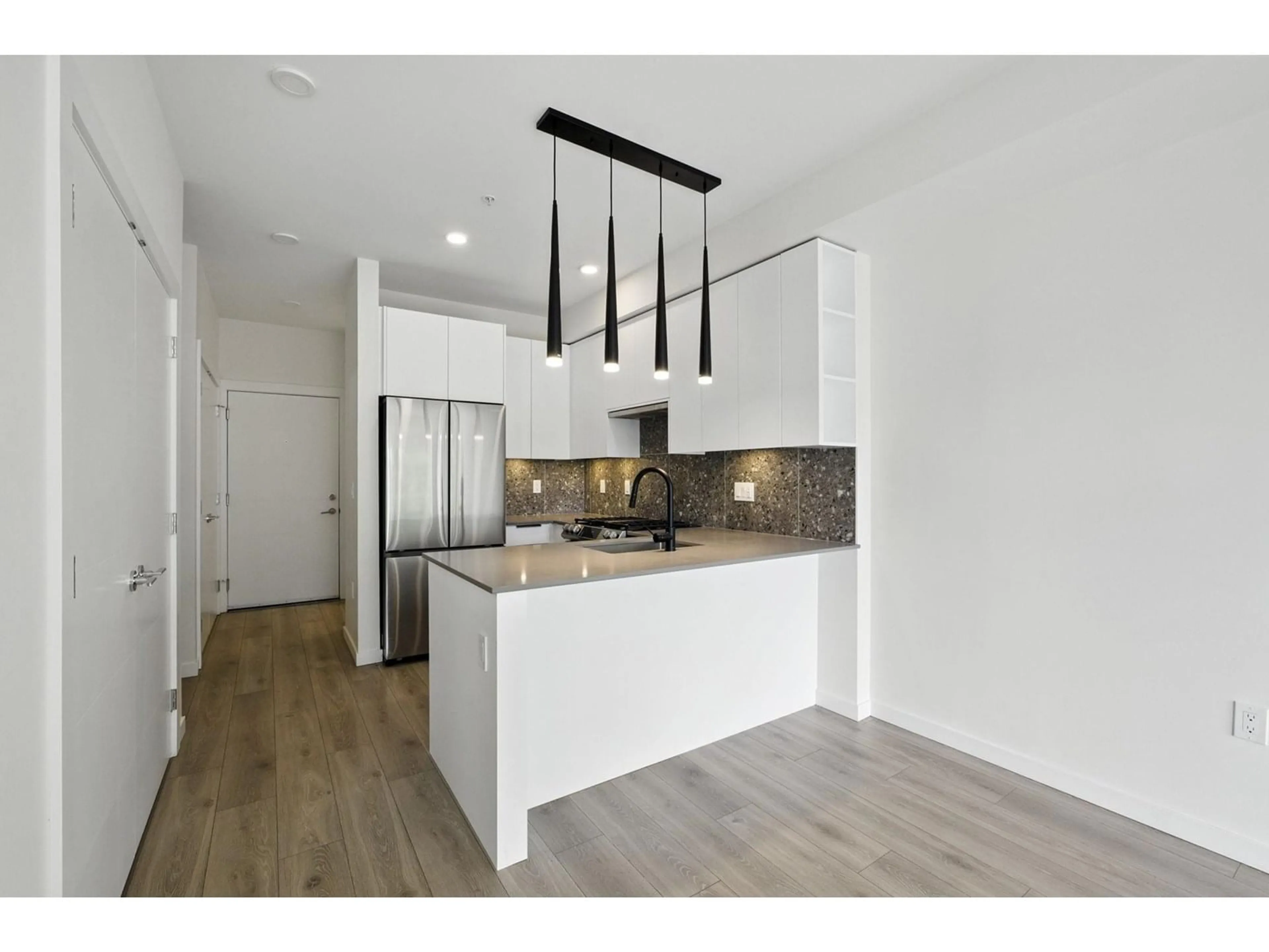 Open concept kitchen, unknown for 310 - 7920 206, Langley British Columbia V2Y3X1