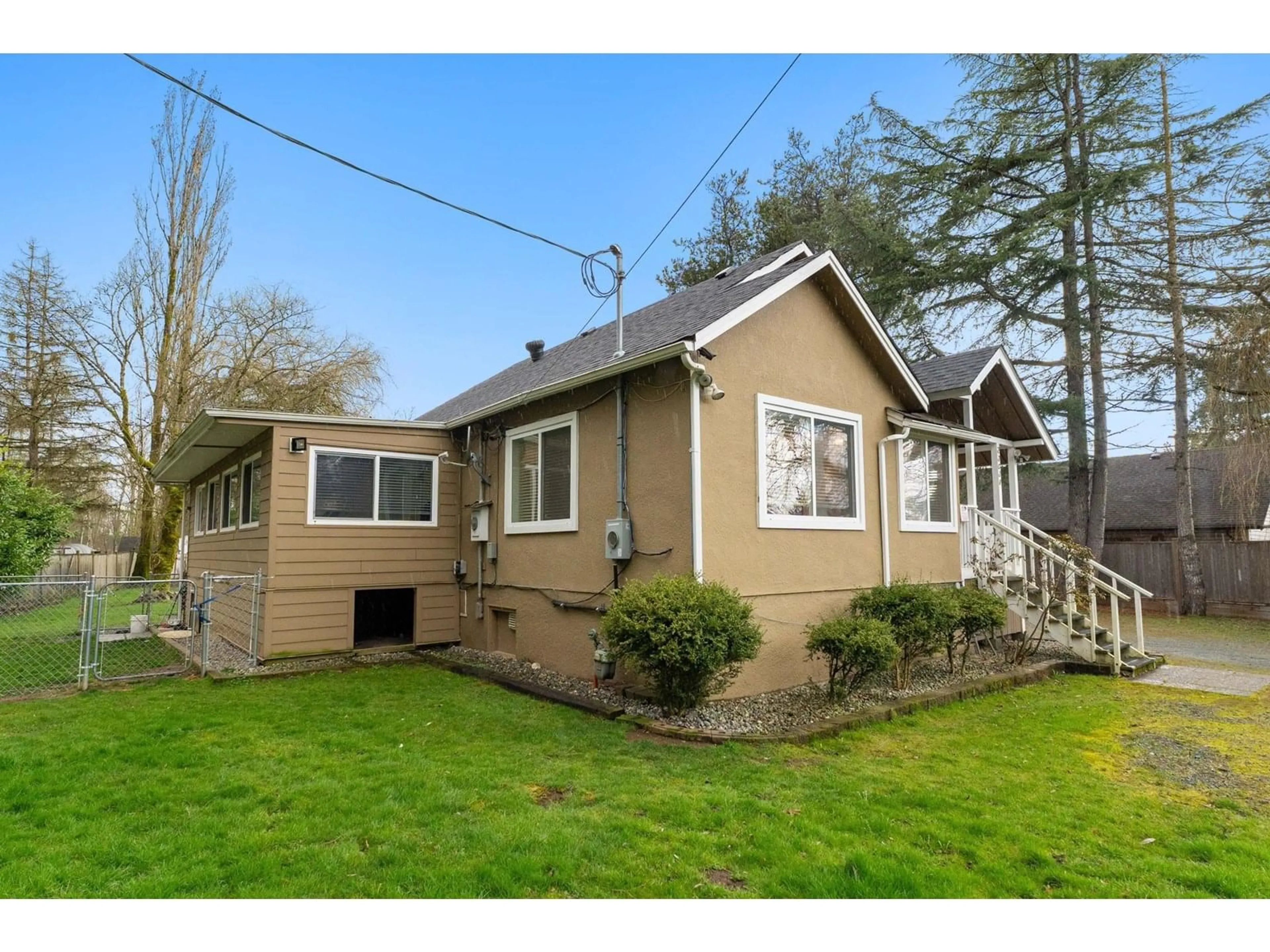 Home with vinyl exterior material, street for 23038 FRASER, Langley British Columbia V2Z2V1