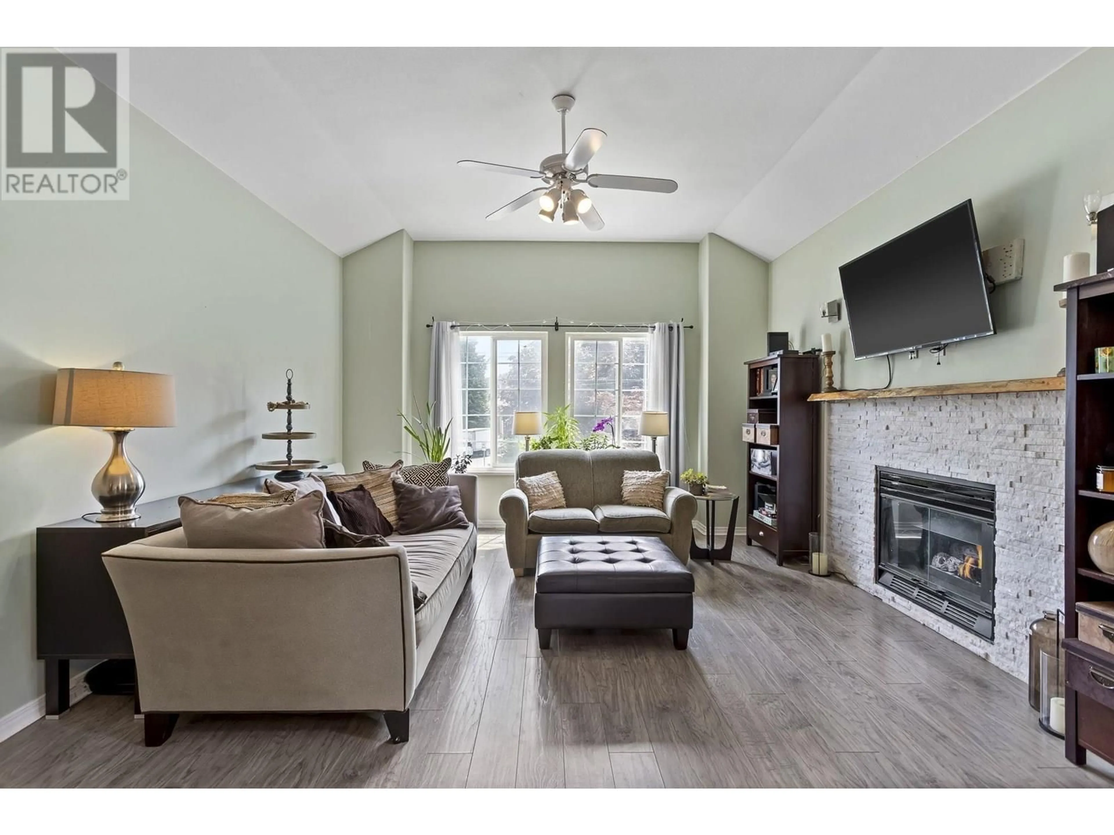 Living room with furniture, wood/laminate floor for 2543 DAVIES AVENUE, Port Coquitlam British Columbia V3C2J7