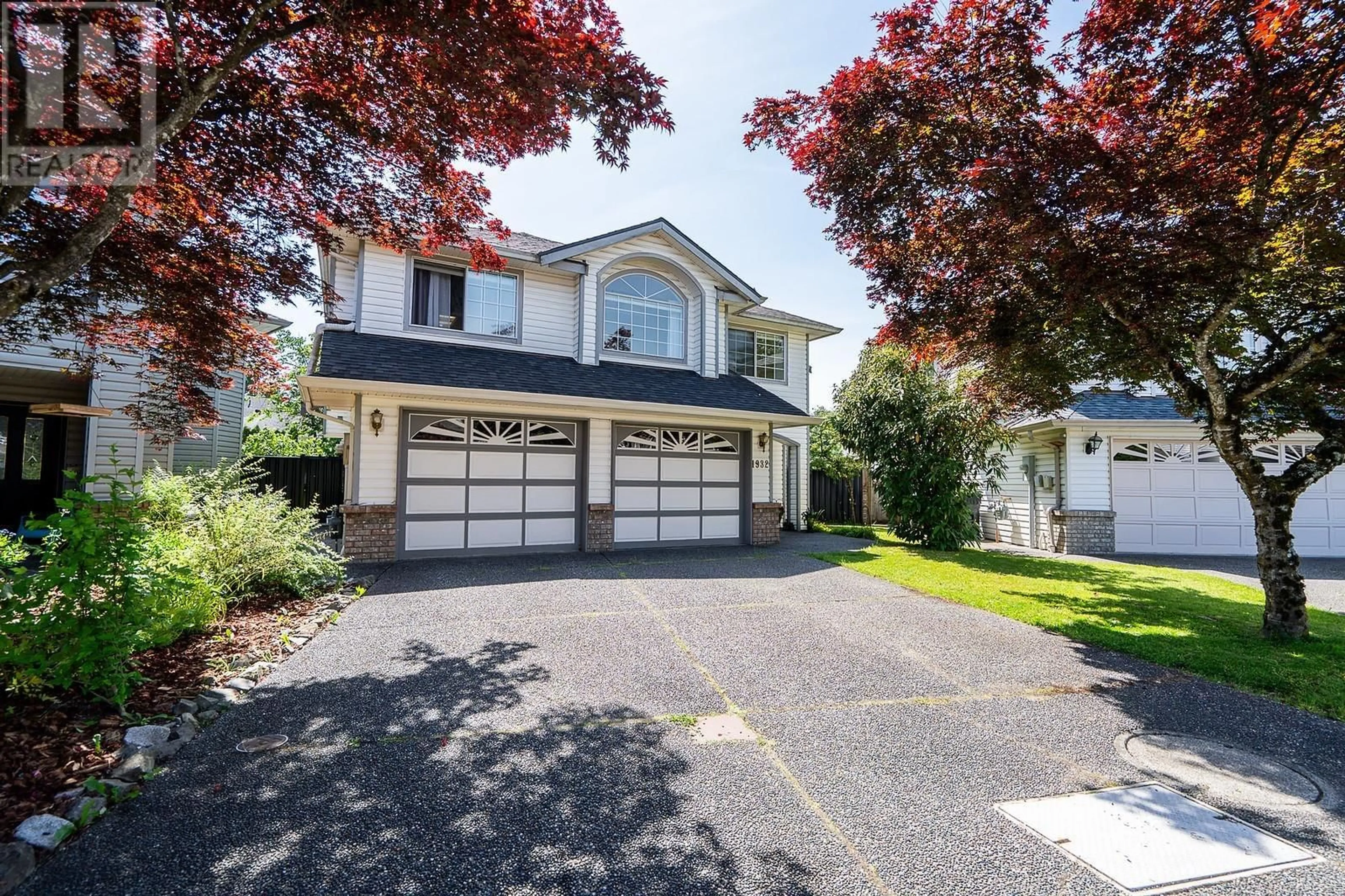 Home with vinyl exterior material, street for 1932 JACANA AVENUE, Port Coquitlam British Columbia V3C5Y4
