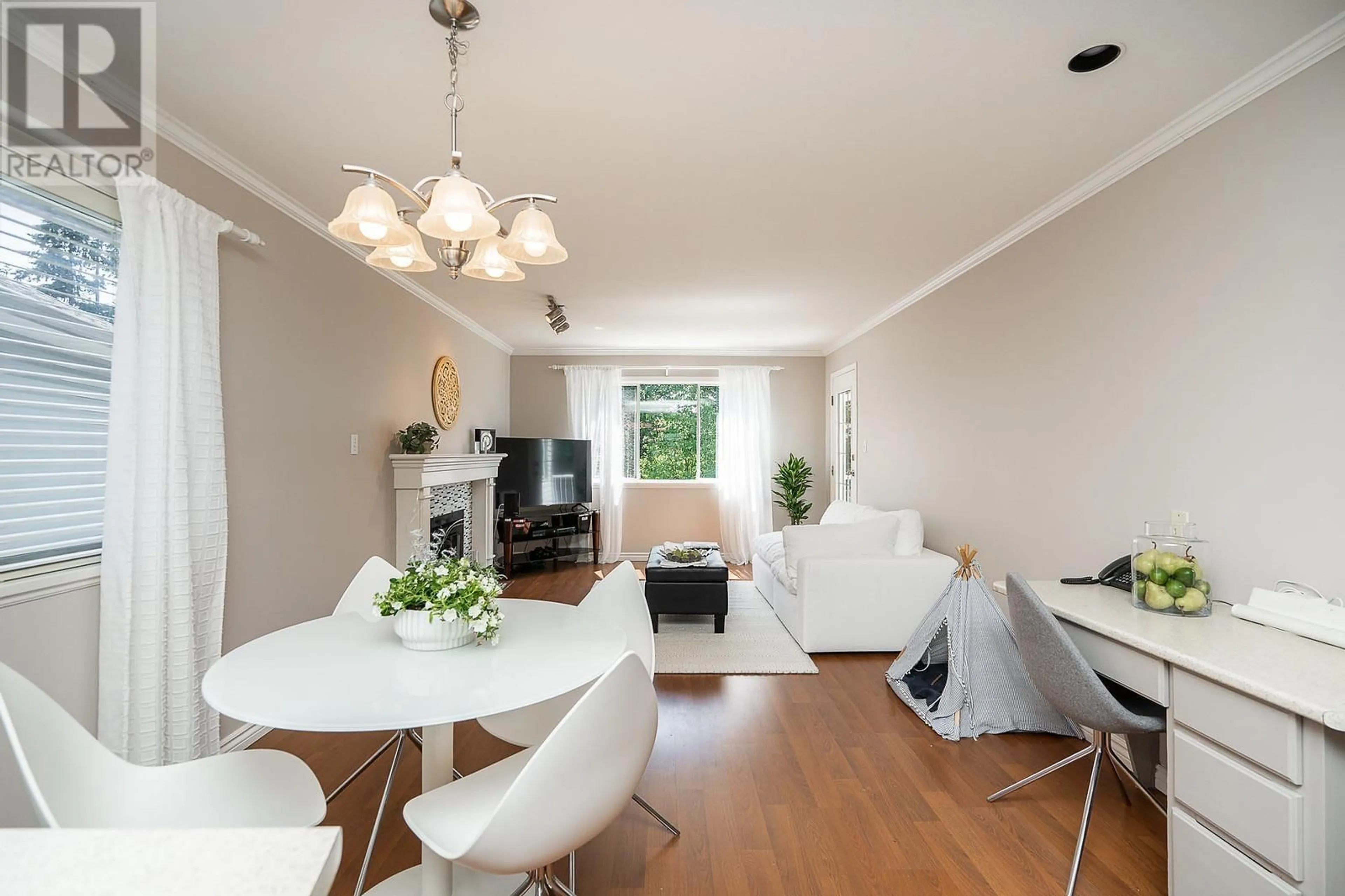 Living room with furniture, wood/laminate floor for 1932 JACANA AVENUE, Port Coquitlam British Columbia V3C5Y4