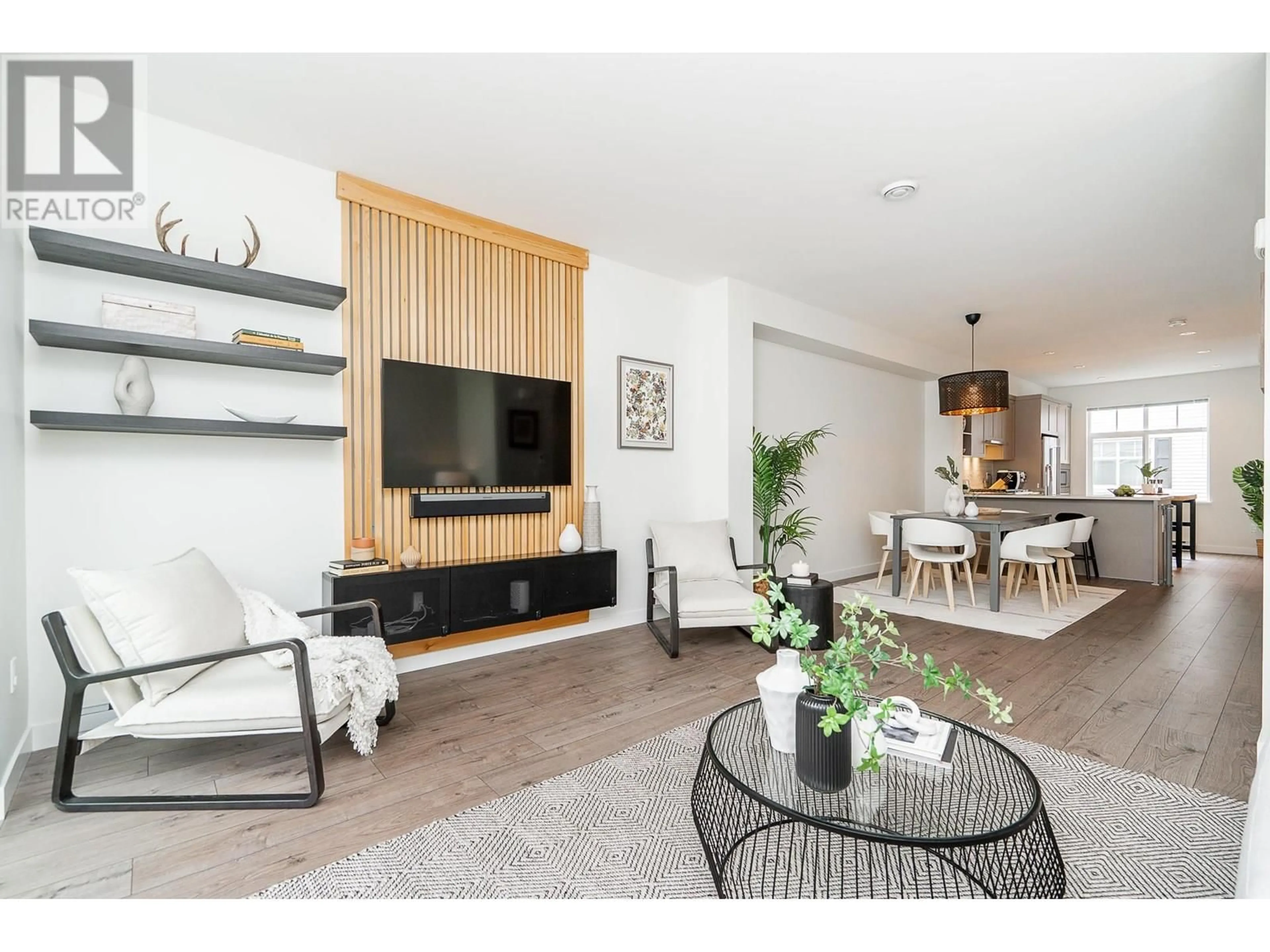 Living room with furniture, wood/laminate floor for 136 - 3565 BAYCREST AVENUE, Coquitlam British Columbia V3B2W7