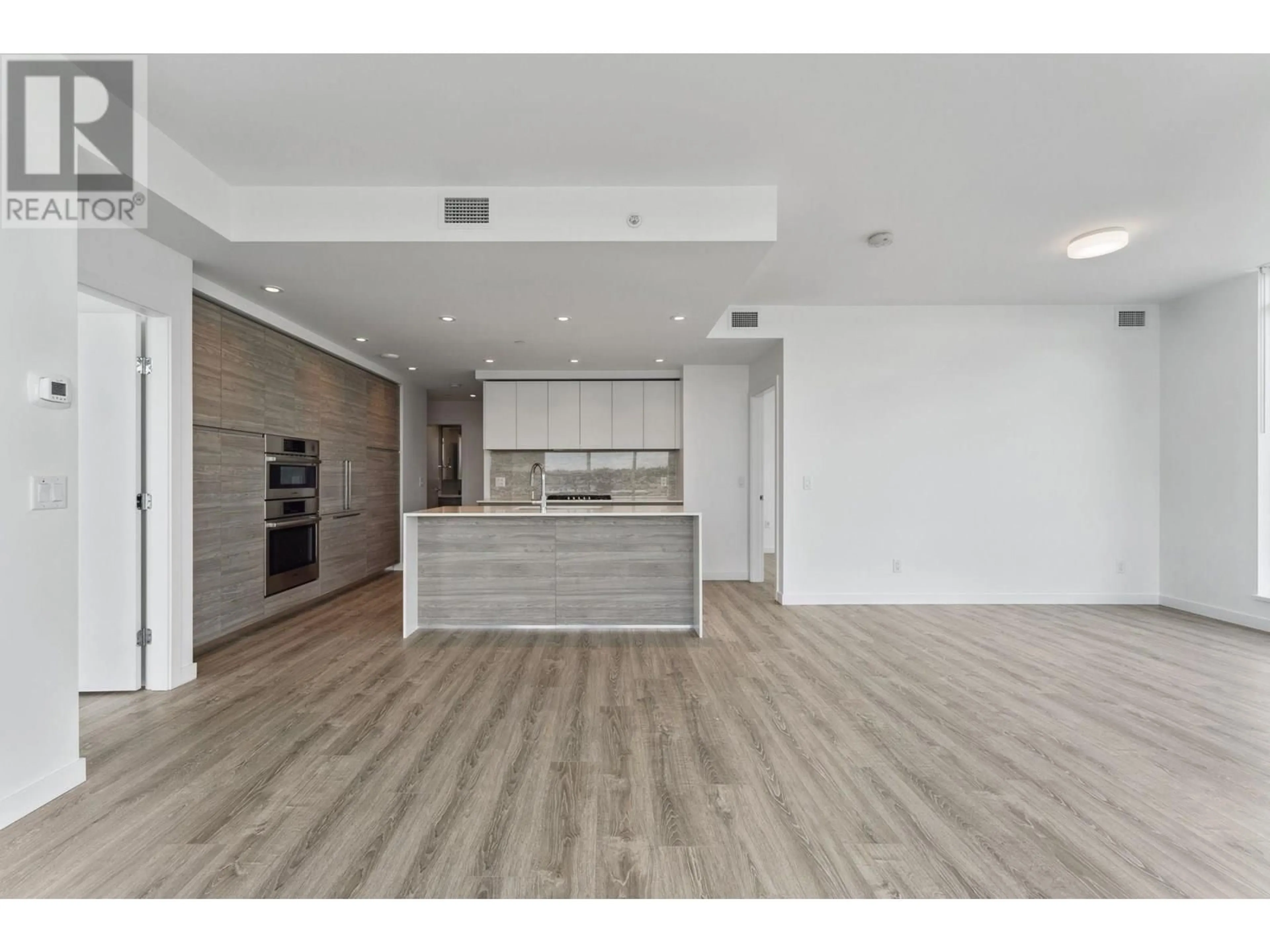 Open concept kitchen, wood/laminate floor for 1408 - 660 QUAYSIDE DRIVE, New Westminster British Columbia V3M0P1
