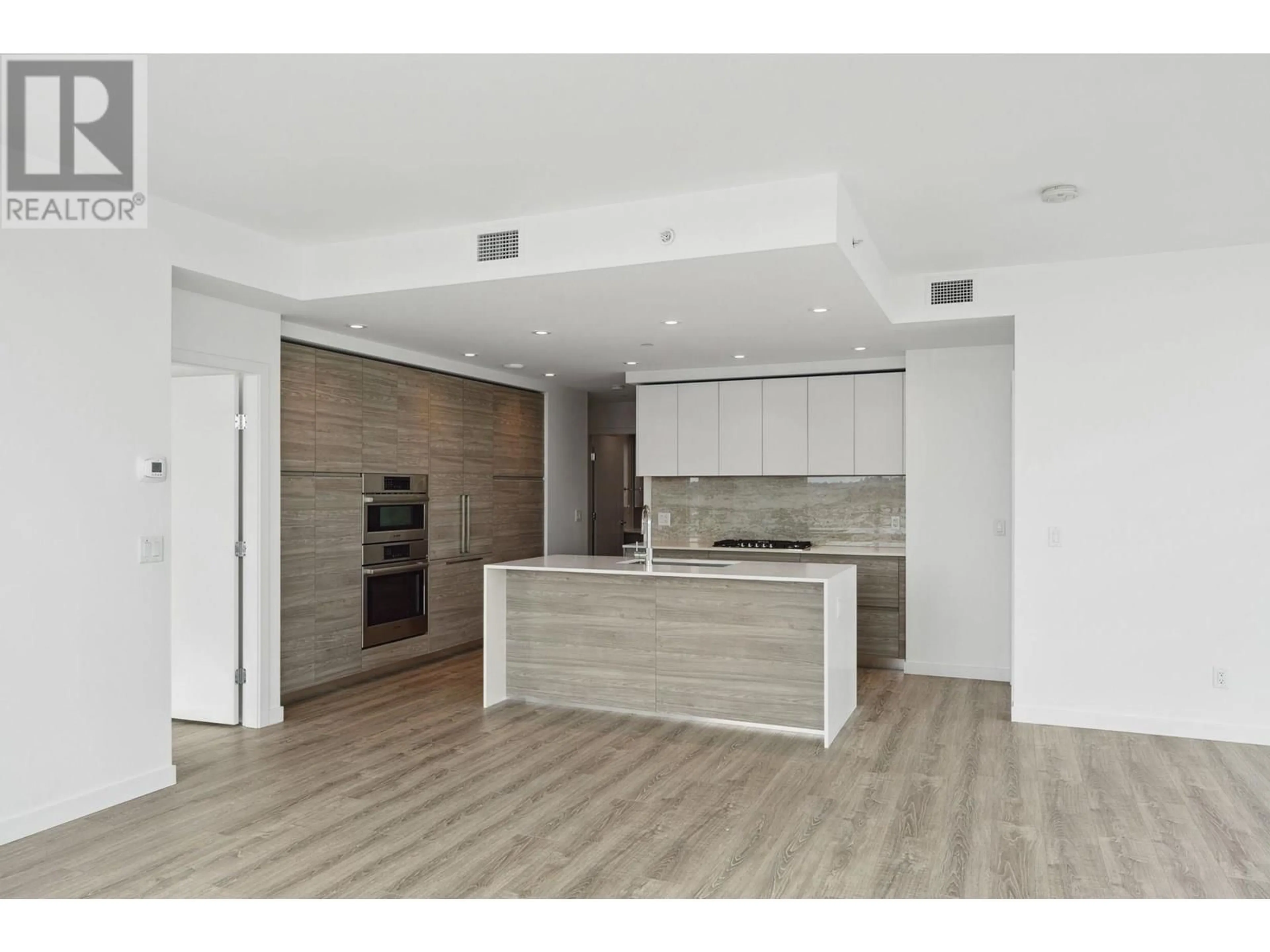 Open concept kitchen, wood/laminate floor for 1408 - 660 QUAYSIDE DRIVE, New Westminster British Columbia V3M0P1