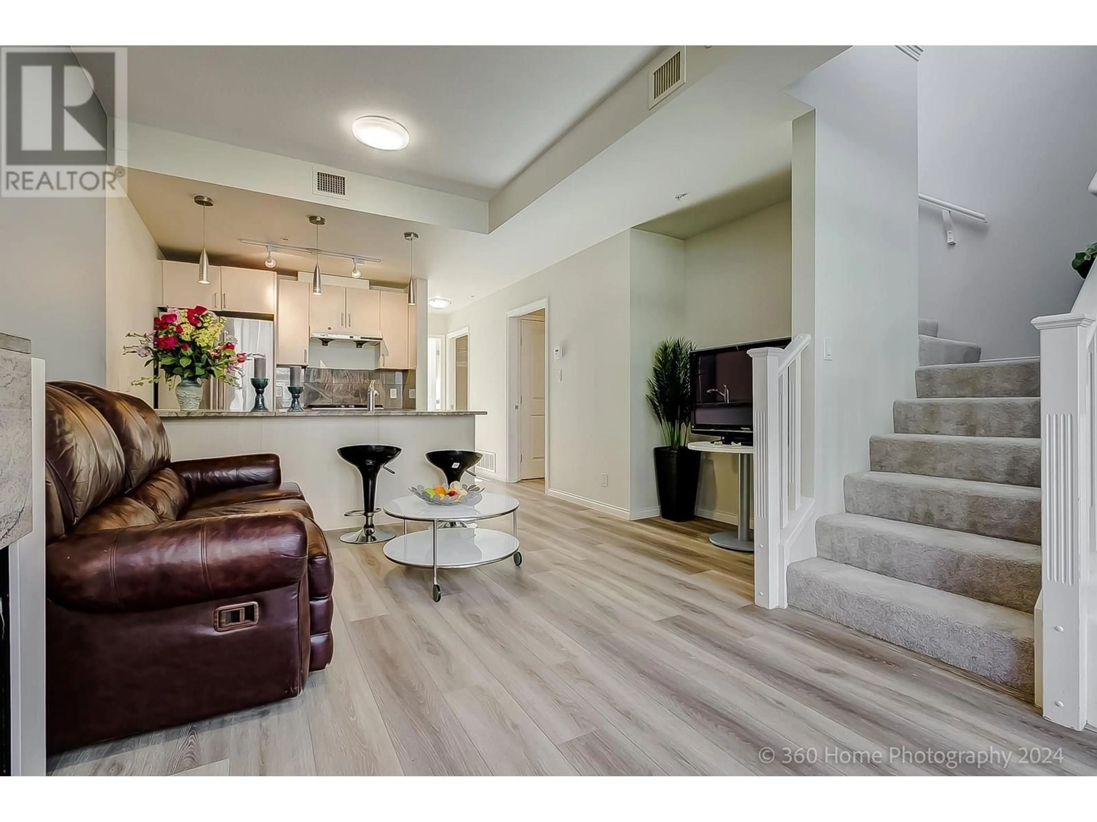 Living room with furniture, unknown for 303 - 1211 MELVILLE STREET, Vancouver British Columbia V6E0A7