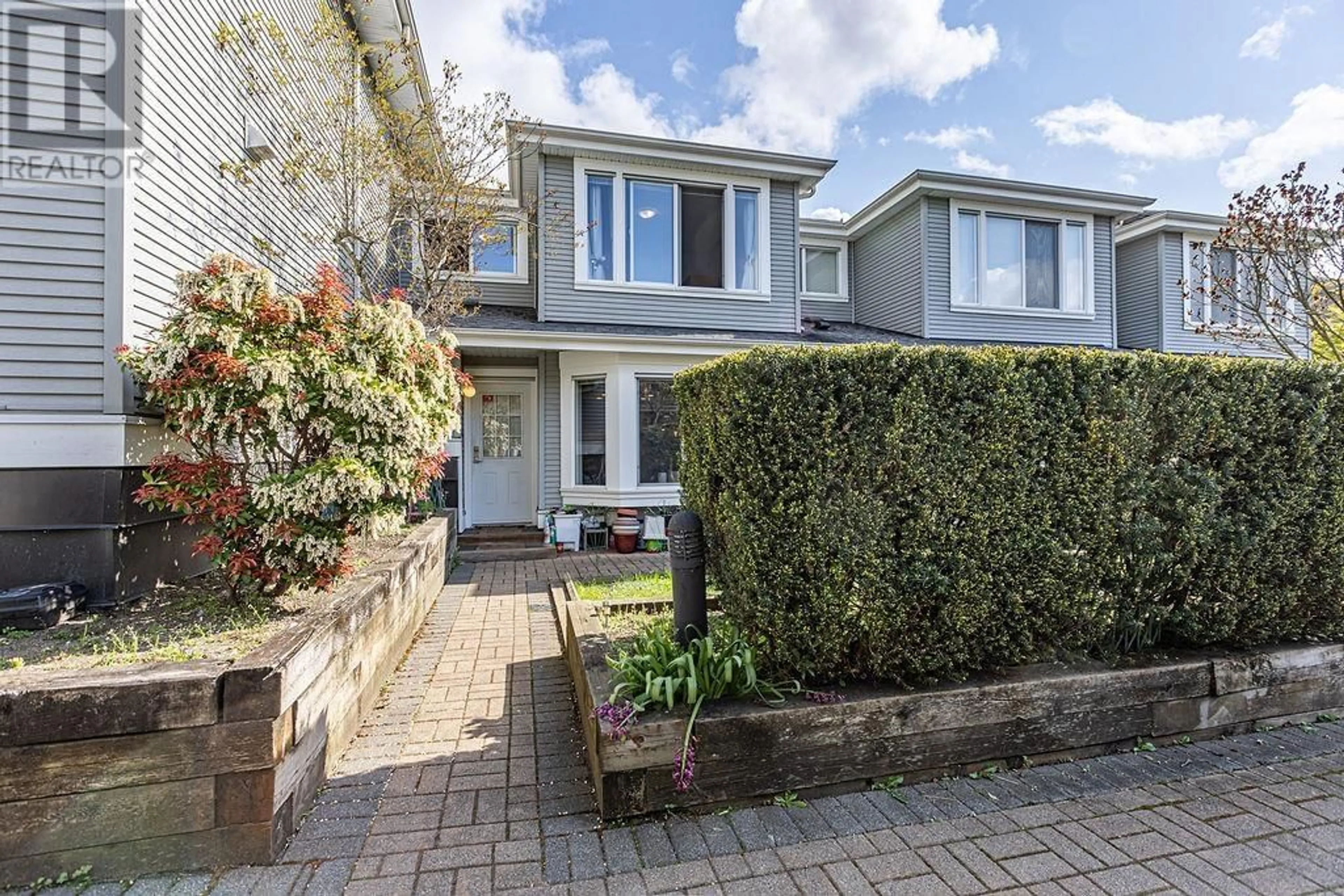 A pic from outside/outdoor area/front of a property/back of a property/a pic from drone, street for 10 - 7370 STRIDE AVENUE, Burnaby British Columbia V3N5E6