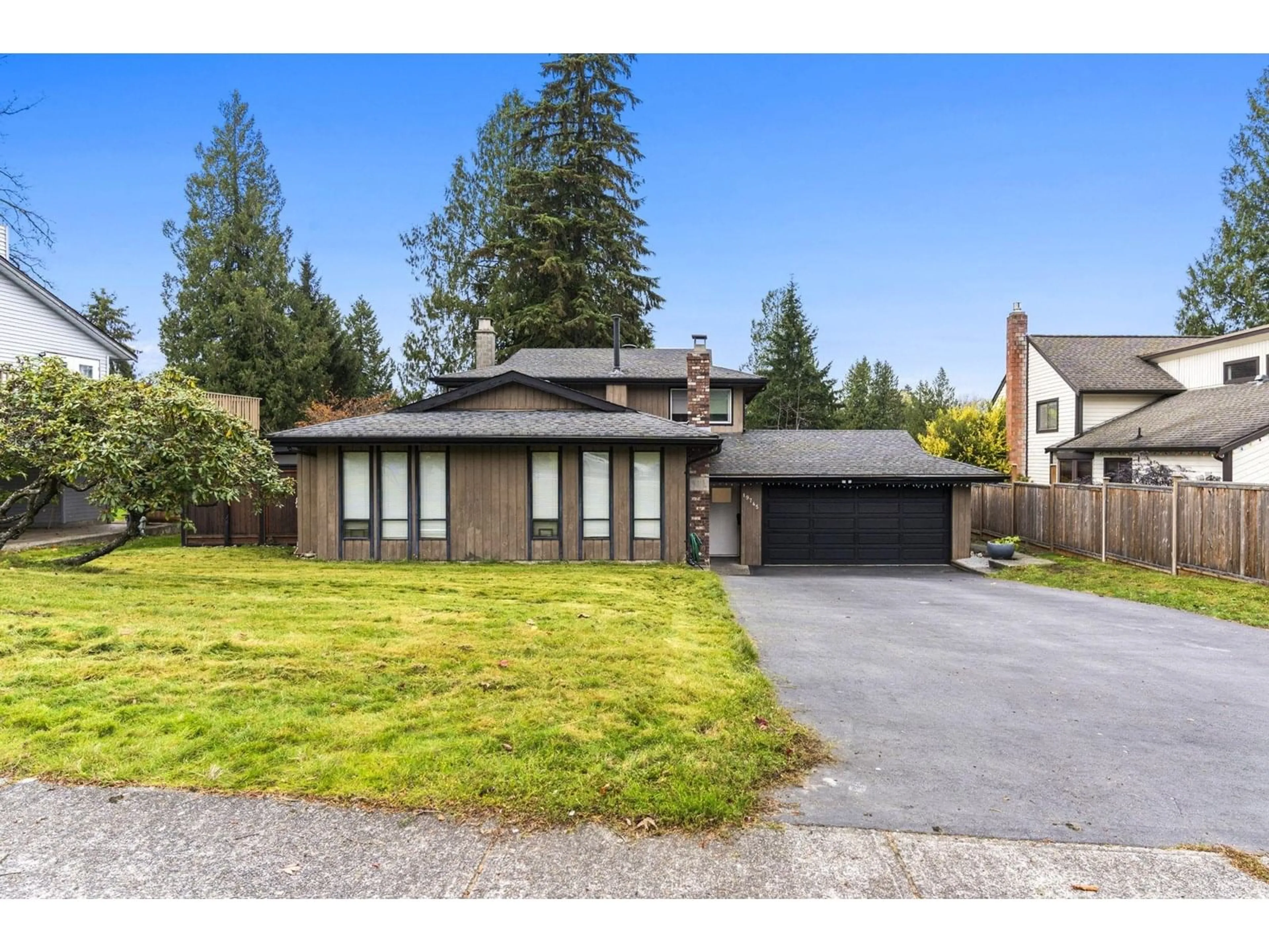 Home with vinyl exterior material, street for 19745 48A, Langley British Columbia V3A4W2