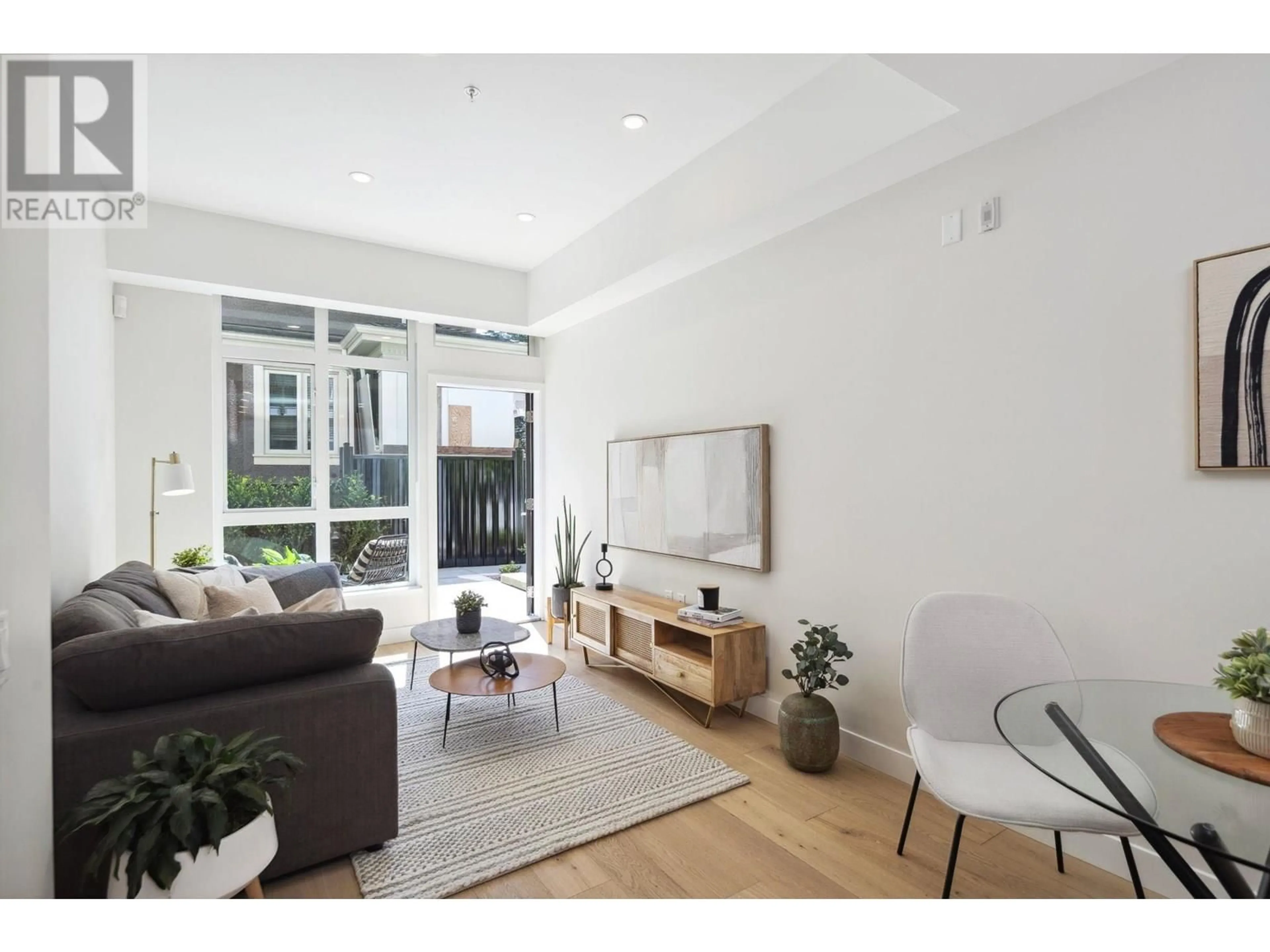 Living room with furniture, unknown for 102 - 5007 ASH STREET, Vancouver British Columbia V5Z0K9