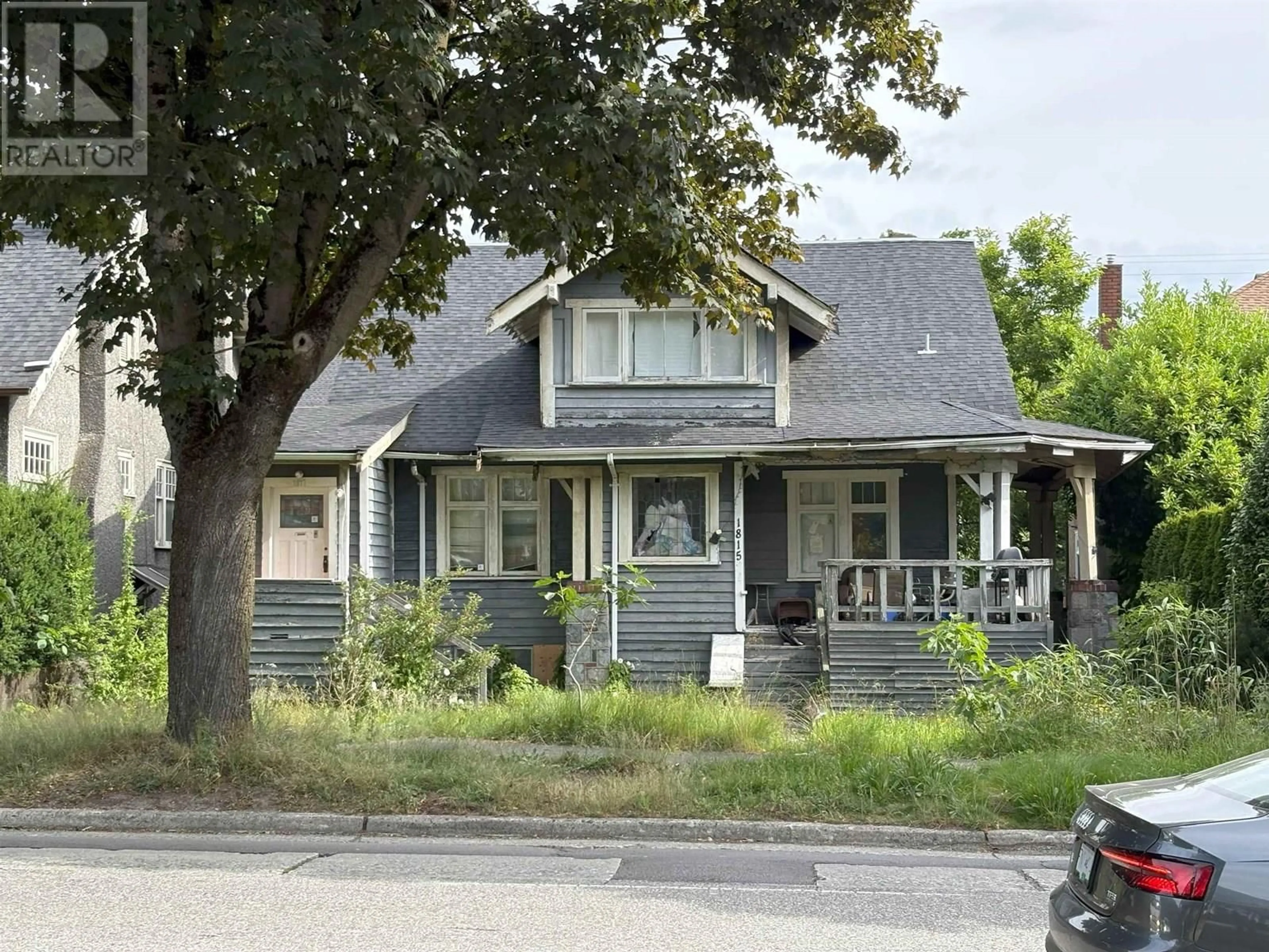 Home with vinyl exterior material, street for 1815 12TH AVENUE, Vancouver British Columbia V6J2E7