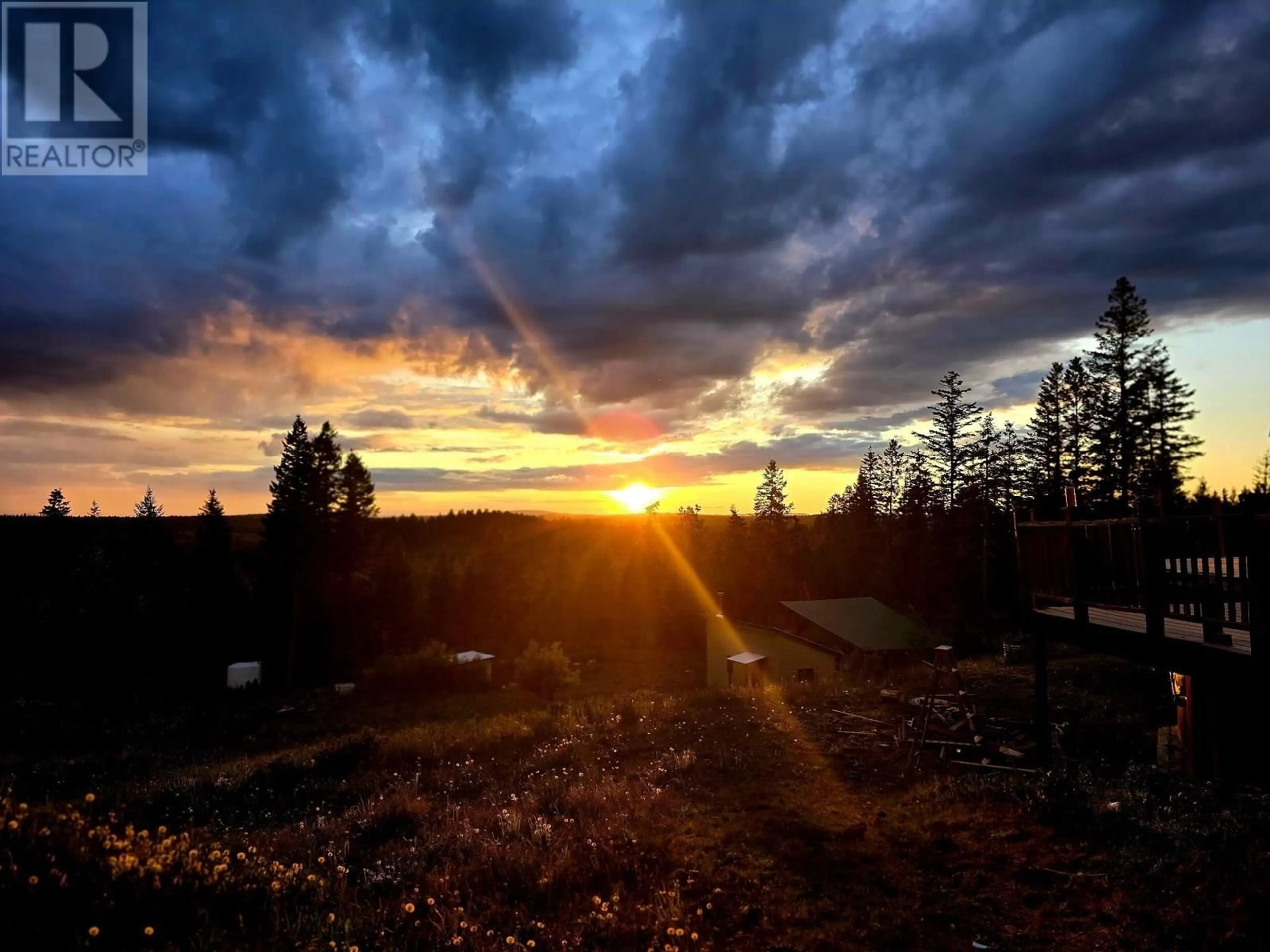 A pic from outside/outdoor area/front of a property/back of a property/a pic from drone, mountain view for 2659 BUNTING LAKE ROAD, 150 Mile House British Columbia V0K2G0