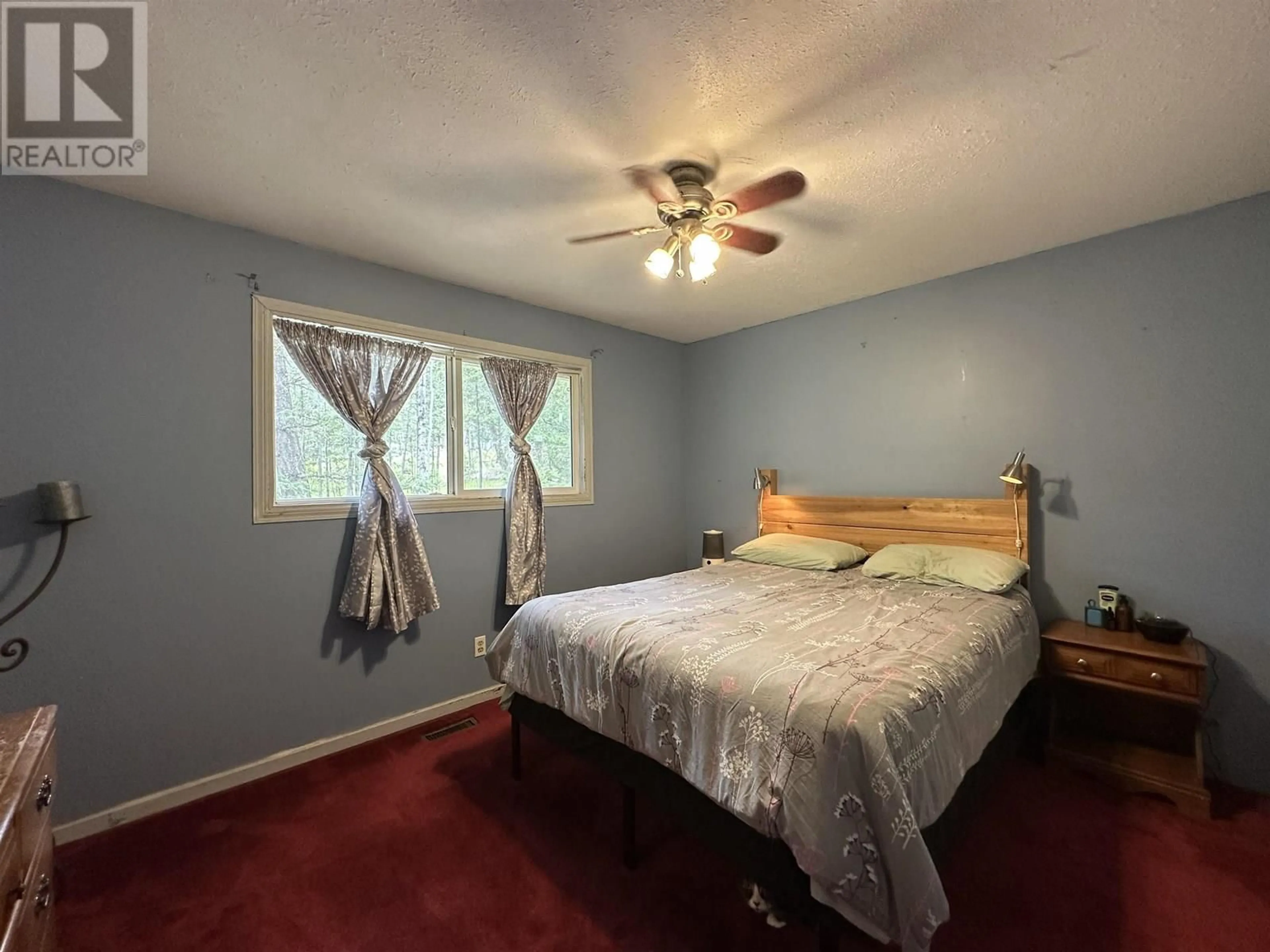 Bedroom with bed, unknown for 4894 TATTERSFIELD PLACE, 108 Mile Ranch British Columbia V0K2Z0