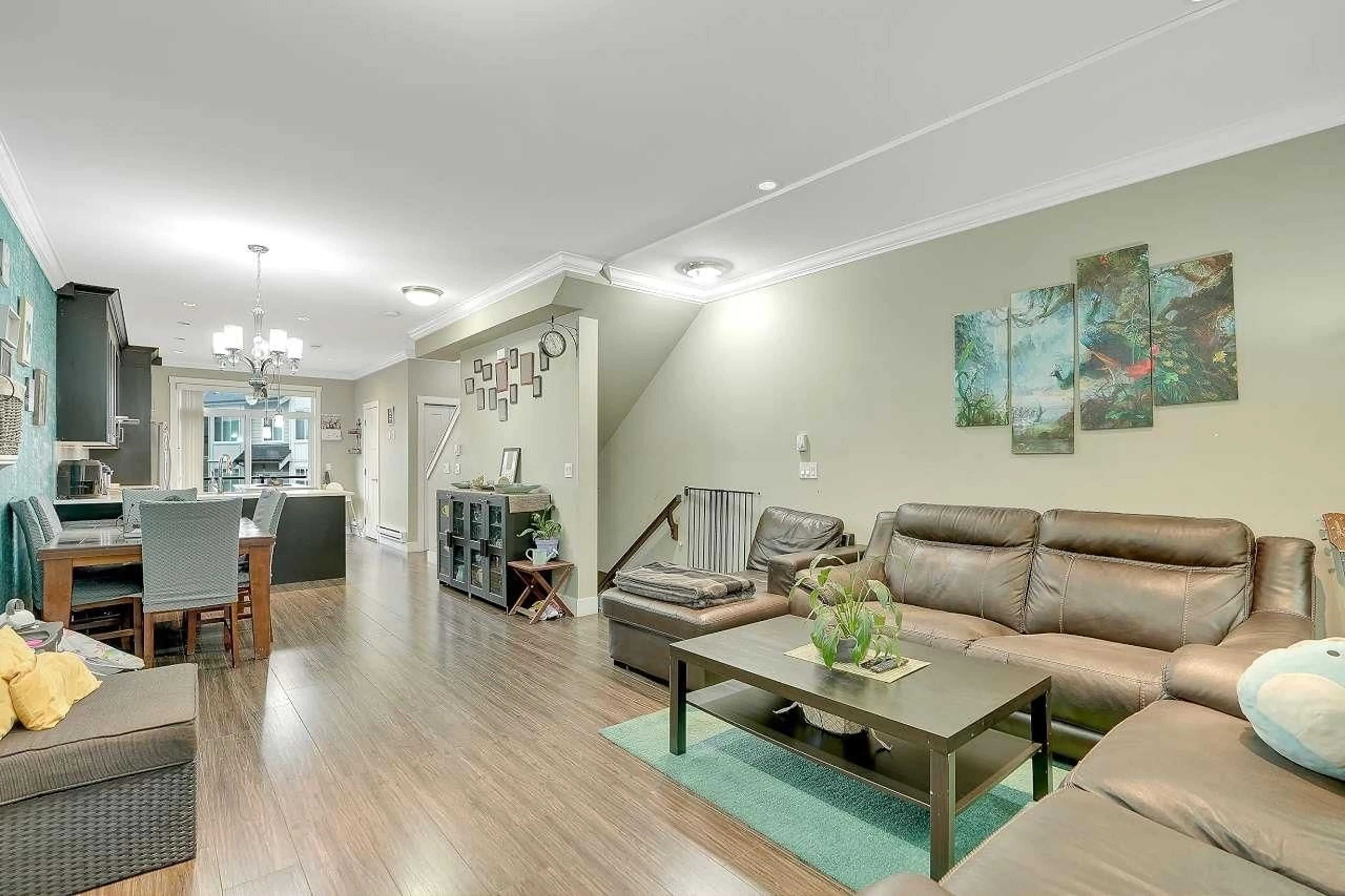 Living room with furniture, wood/laminate floor for 23 - 13670 62, Surrey British Columbia V3X0H8