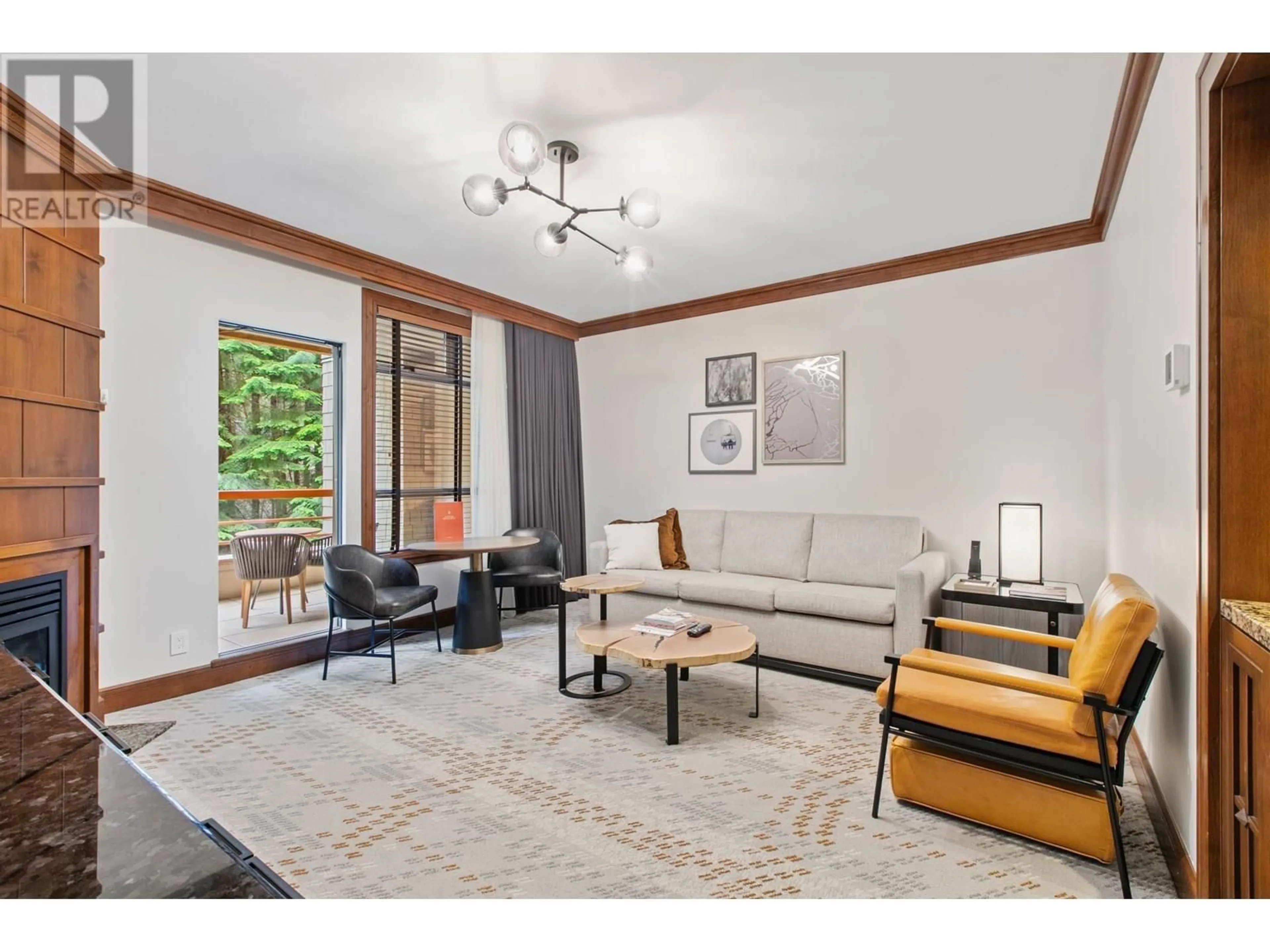 Living room with furniture, unknown for 319 - 4591 BLACKCOMB WAY, Whistler British Columbia V8E0Y4