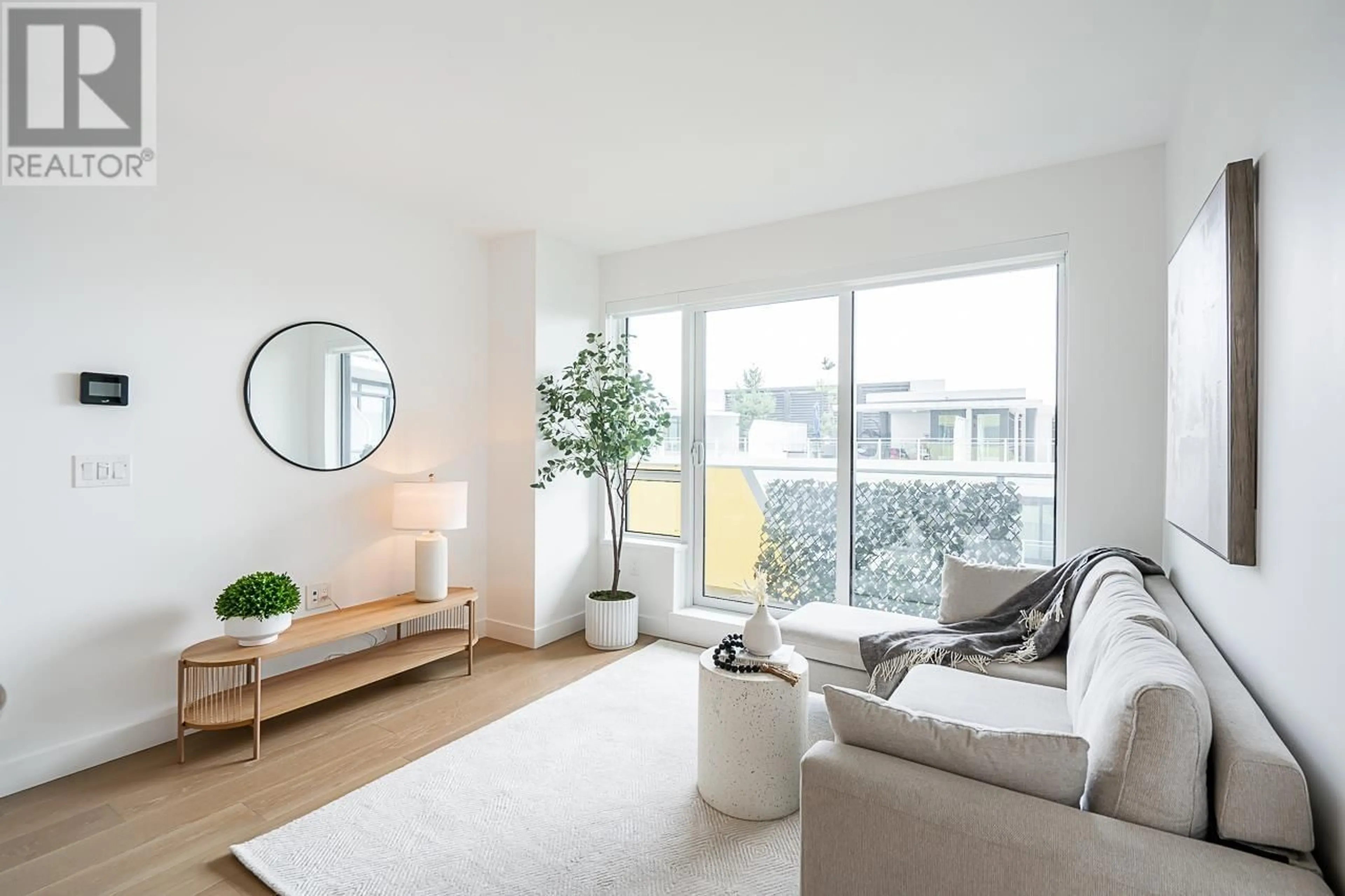 Living room with furniture, unknown for 711 - 5788 GILBERT ROAD, Richmond British Columbia V6X1B7
