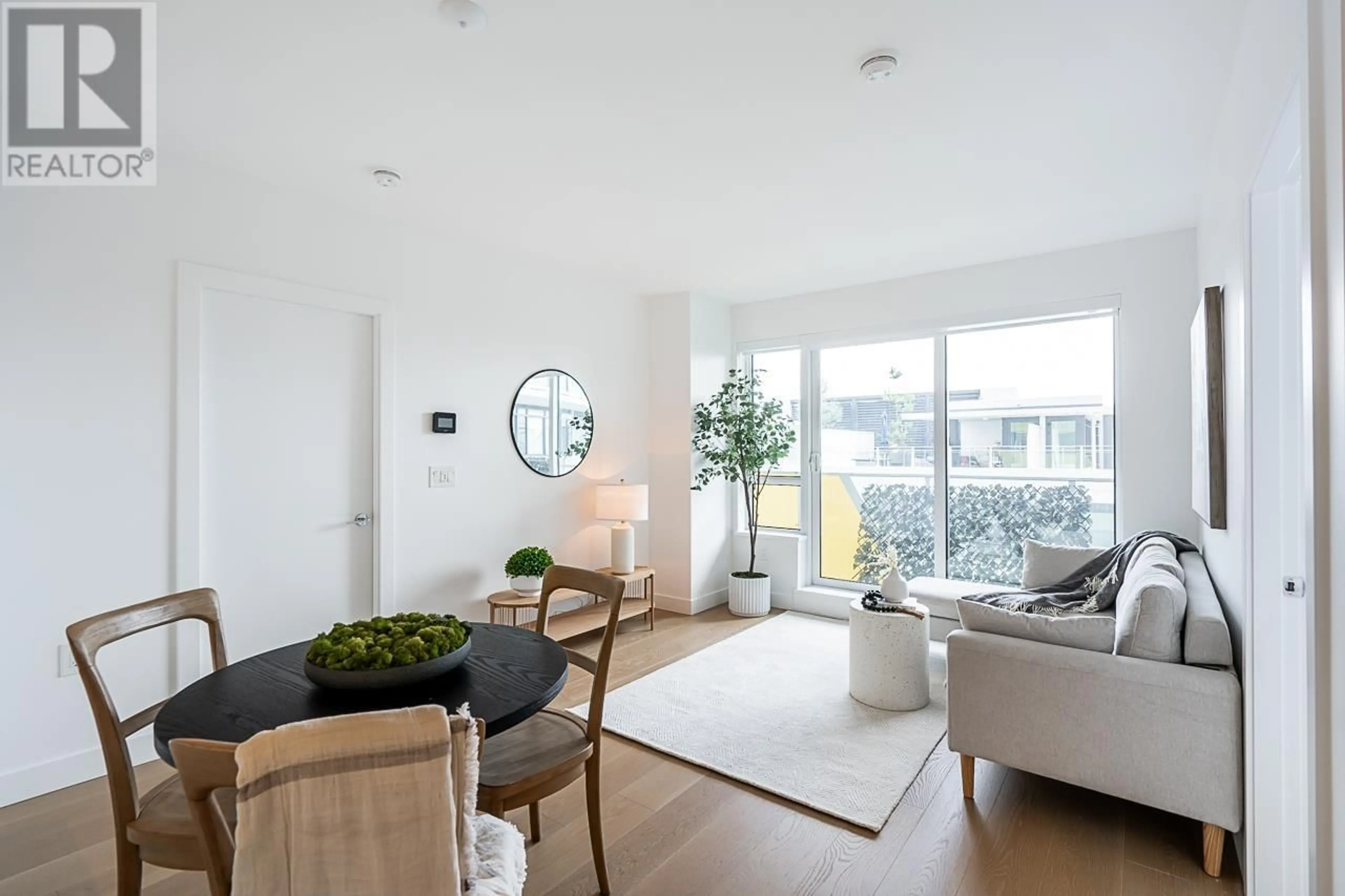 Living room with furniture, unknown for 711 - 5788 GILBERT ROAD, Richmond British Columbia V6X1B7