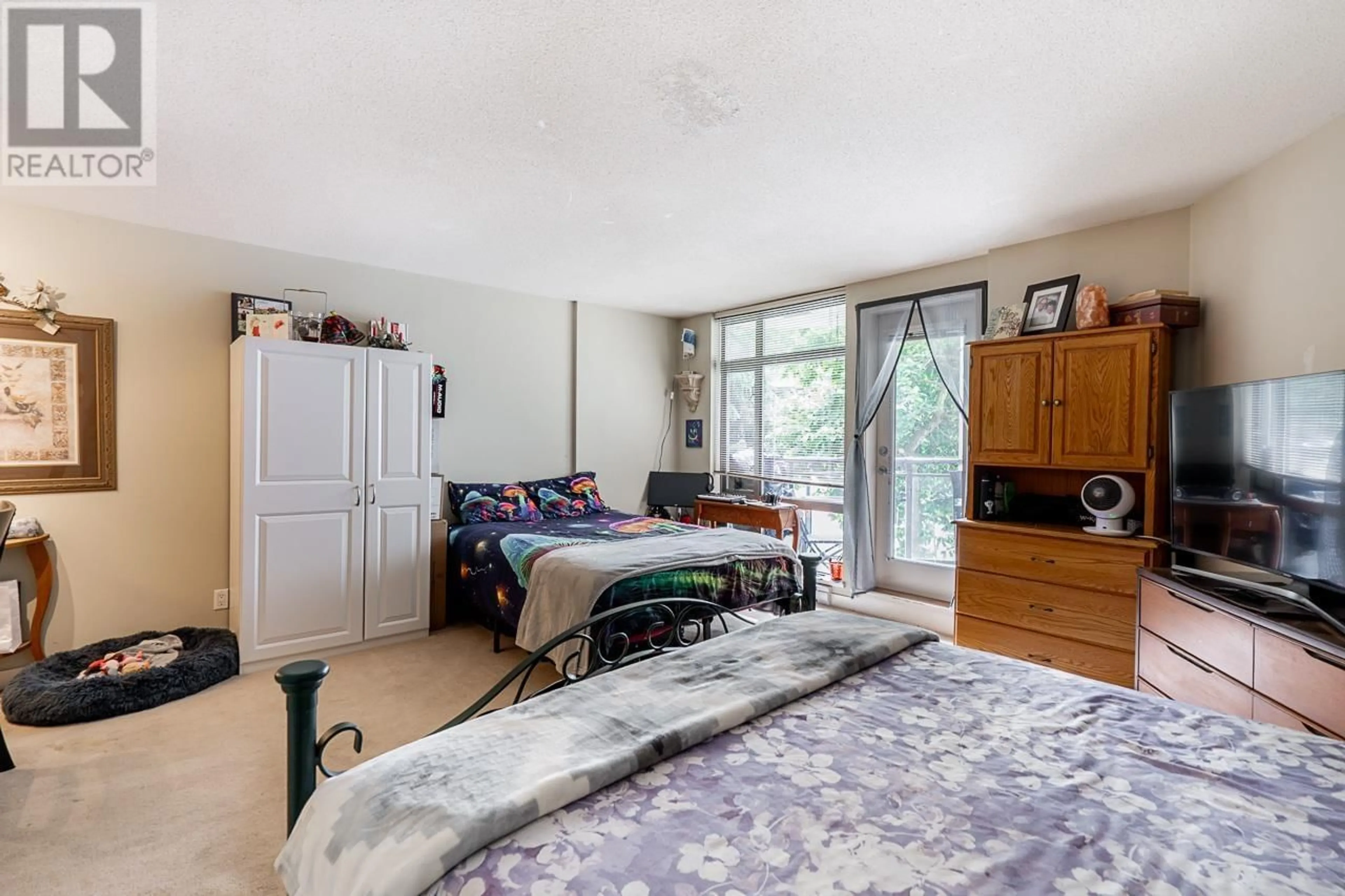 Bedroom with bed, unknown for 211 - 3660 VANNESS AVENUE, Vancouver British Columbia V5R6H8