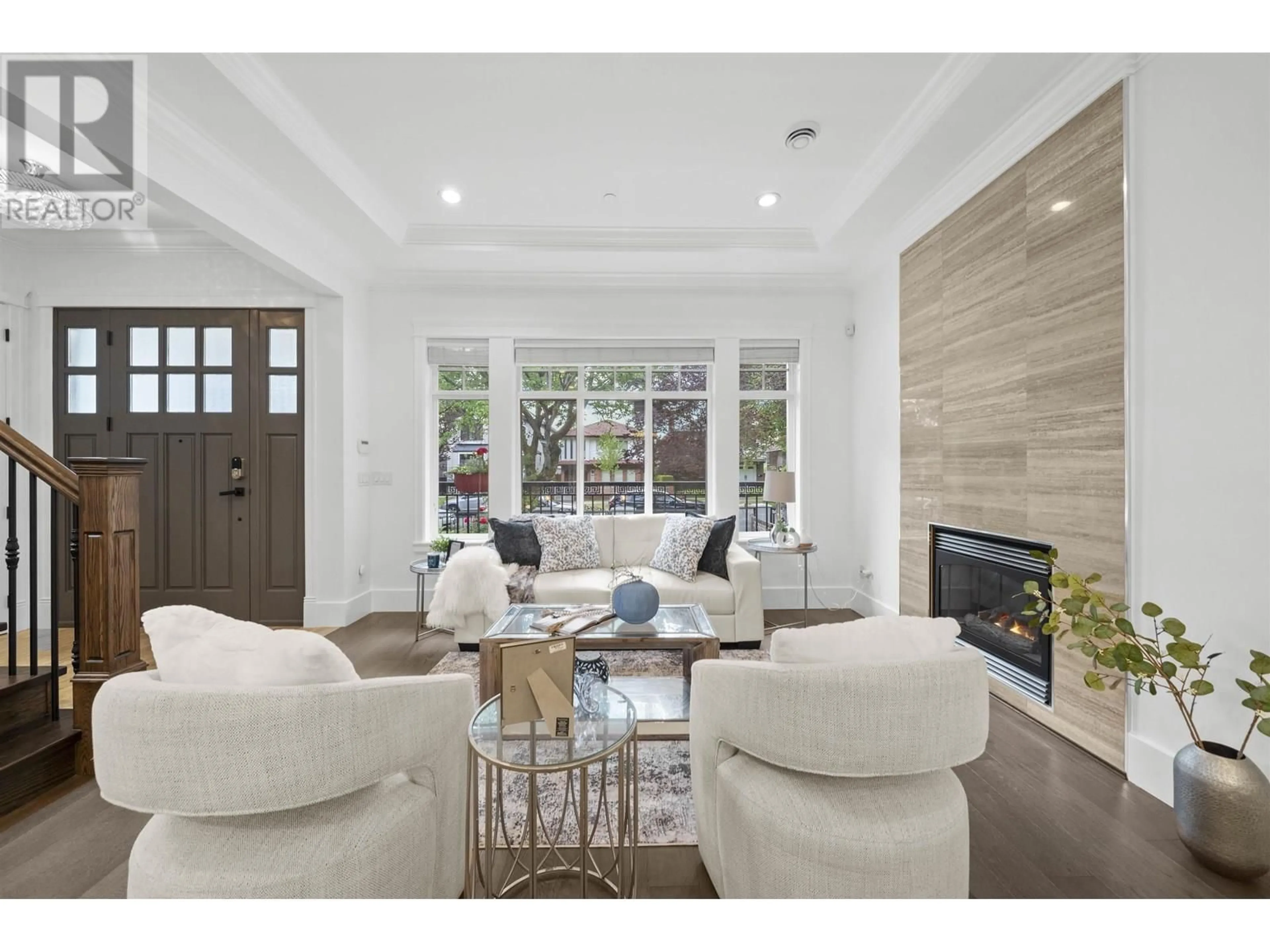 Living room with furniture, ceramic/tile floor for 6646 BROOKS STREET, Vancouver British Columbia V5S3J5